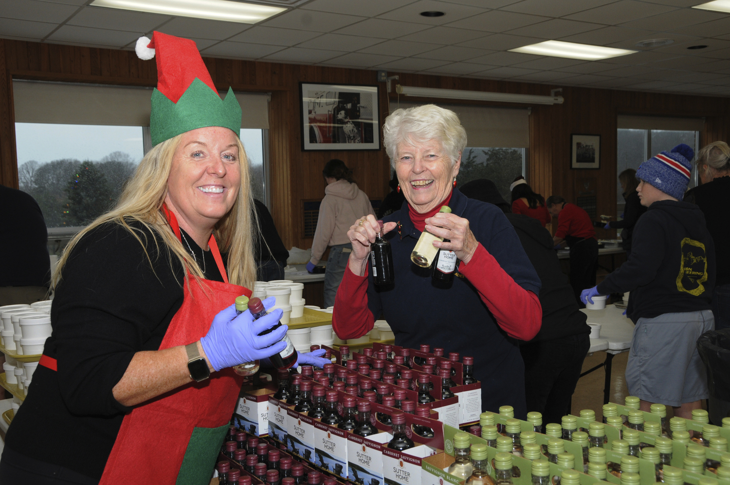 Orla Reville-Hejducek and Barbara Raynor at the Montauk Fire Department's annual Holiday Senior Dinner on Sunday.  RICHARD LEWIN