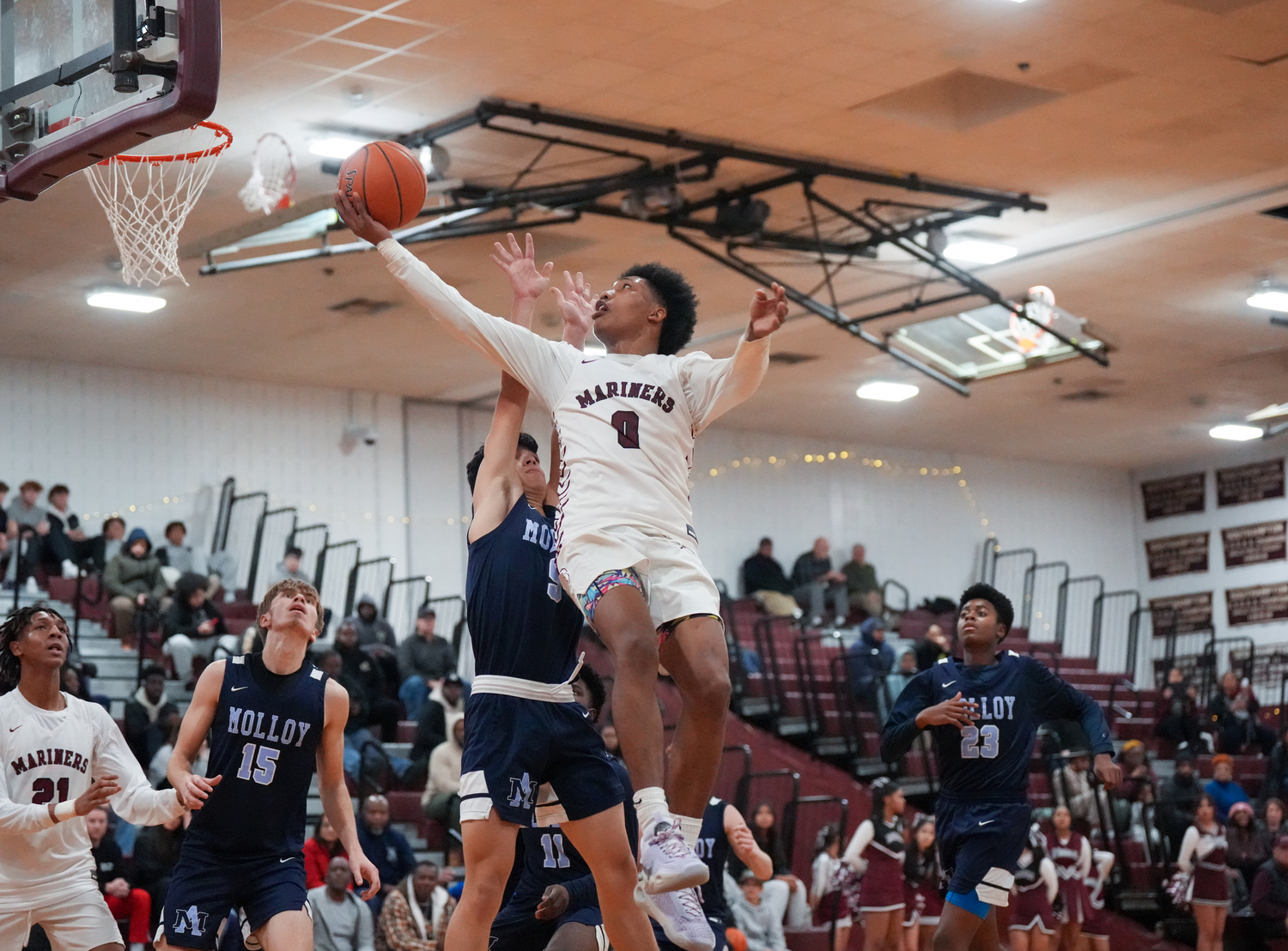 Southampton junior Naevon Williams scored a game-high 21 points and also had 11 rebounds and five assists in the Mariners victory over Archbishop Molloy on December 22.   RON ESPOSITO/SOUTHAMPTON SCHOOL DISTRICT
