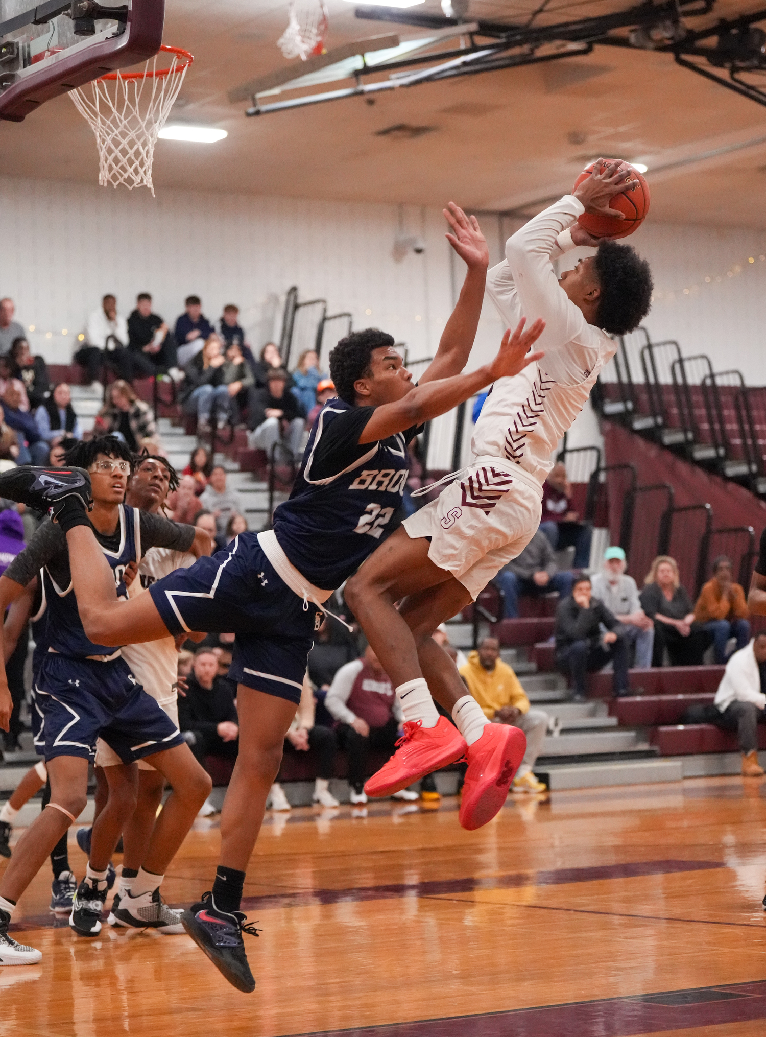 Southampton junior Naevon Williams shoots a jumper over a Stony Brook School defender.   RON ESPOSITO/SOUTHAMPTON SCHOOL DISTRICT