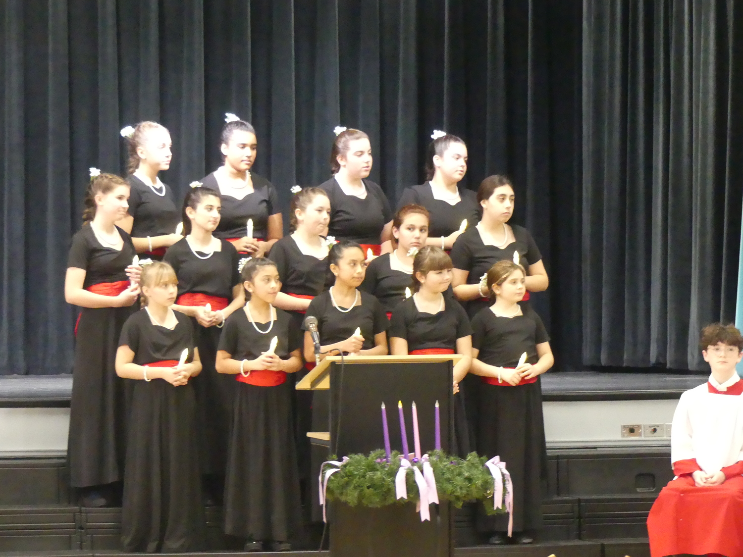 The Hamptones, along with other performing groups at Our Lady of the Hamptons School, have been rehearsing for the school's annual Christmas Show, set for Monday, December 18 at 7 p.m.  The community is invited to attend the performance, which is free, offered as a gift to the community from the school. COURTESY OUR LADY OF THE HAMPTONS SCHOOL