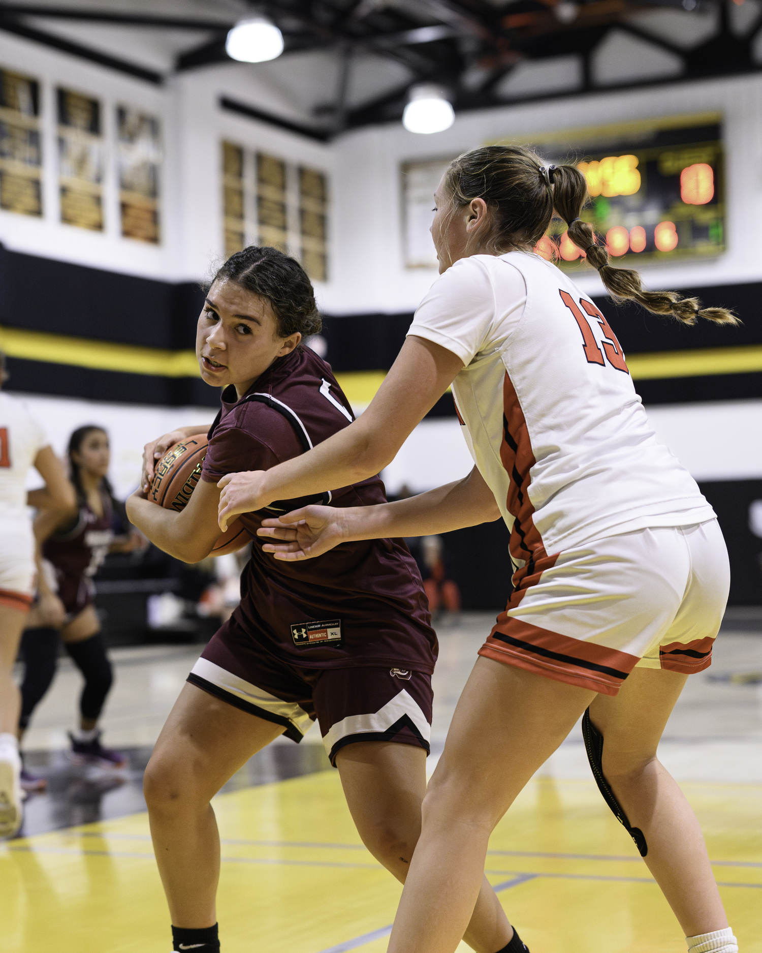 Junior Mia Arnold maintains control of the ball. MARIANNE BARNETT