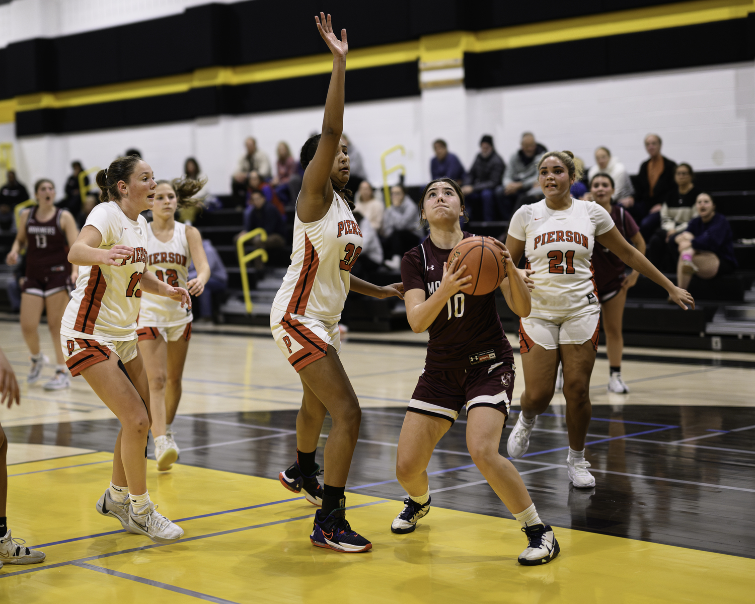 Senior Annie Hattrick plants herself in place to take a shot. MARIANNE BARNETT