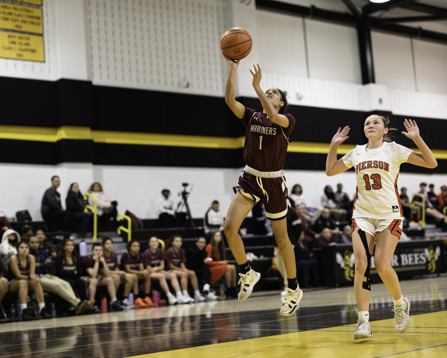 Junior Daelyn Palmore breaks to the basket. MARIANNE BARNETT