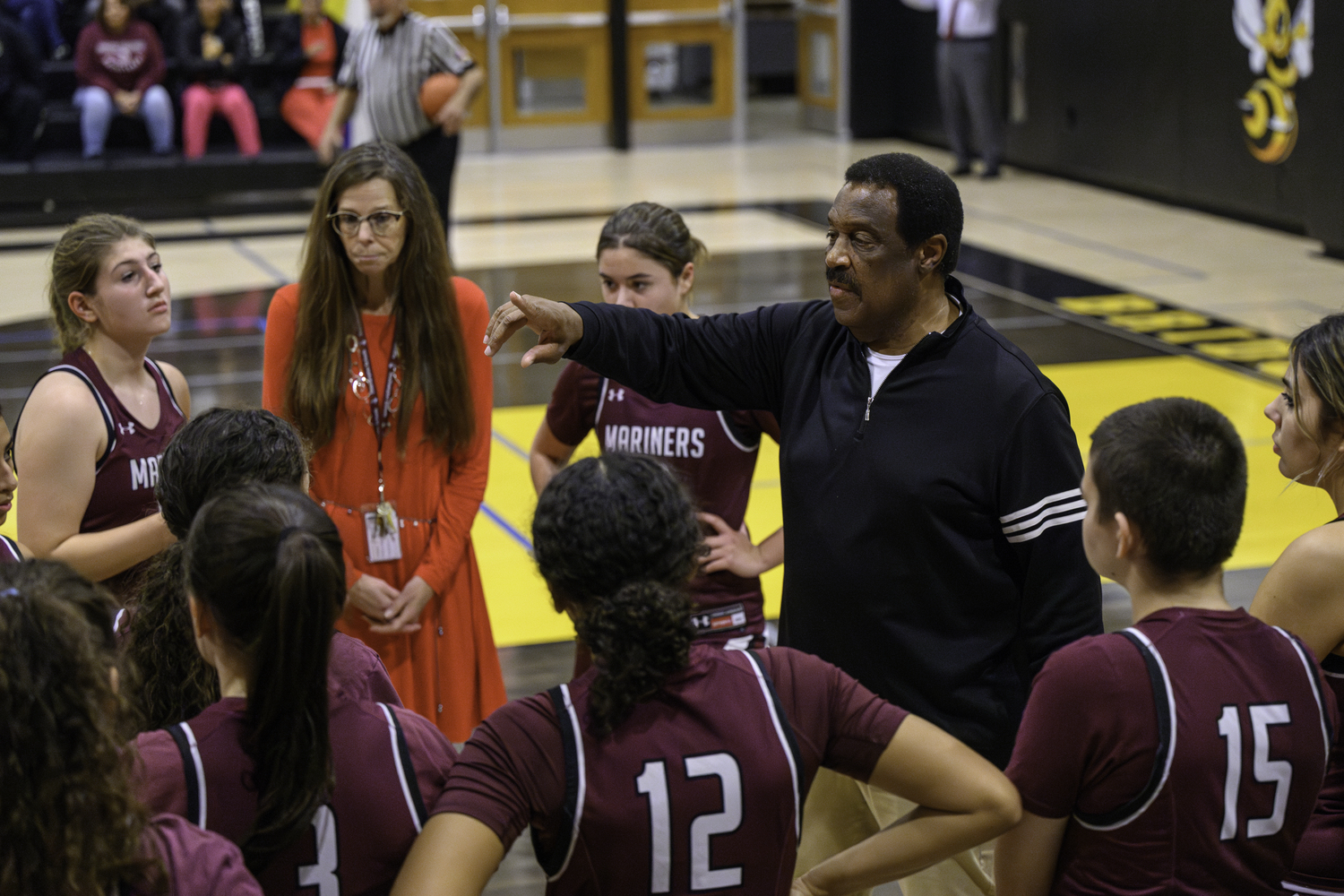 Head coach Juni Wingfield with his team. MARIANNE BARNETT