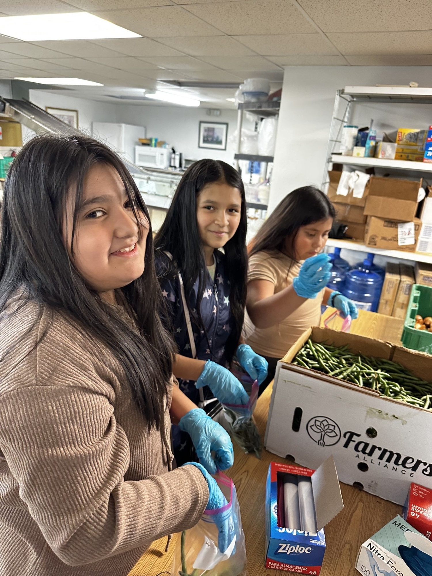 Members of the Southampton Intermediate School Builders Club recently volunteered their time at the nonprofit Heart of the Hamptons, where they organized and restocked the food pantry while also preparing food bags for the upcoming week. COURTESY SOUTHAMPTON SCHOOL DISTRICT