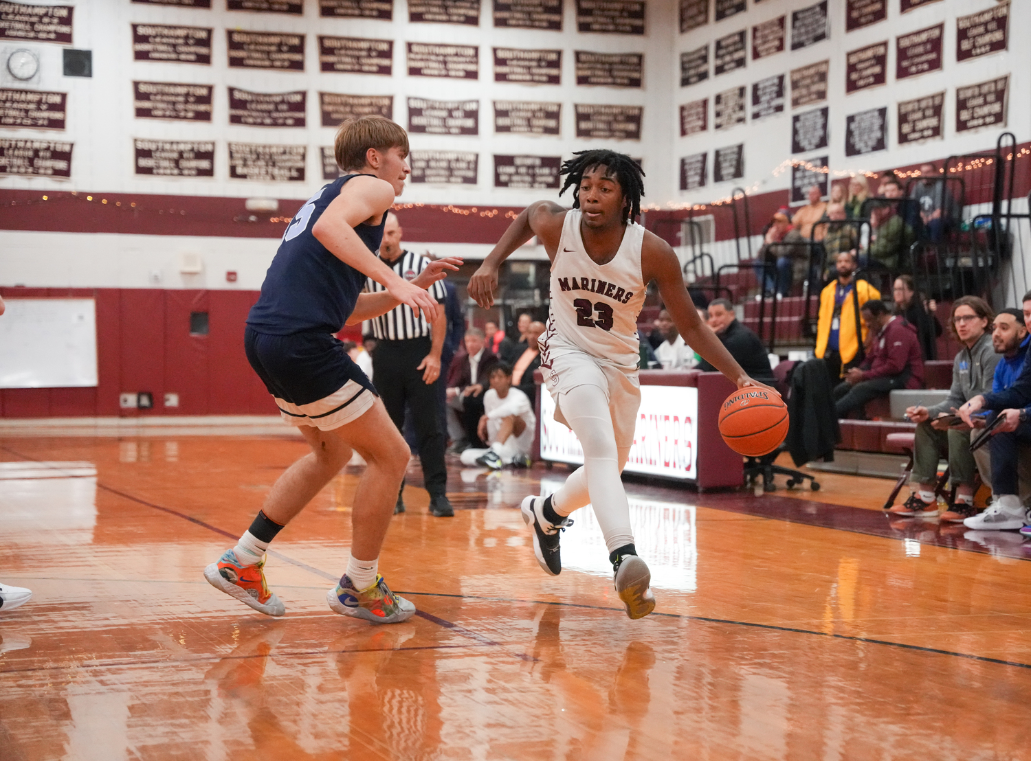 Mariner Tyler Blake drives on an Archbishop Molloy defender.   RON ESPOSITO/SOUTHAMPTON SCHOOL DISTRICT