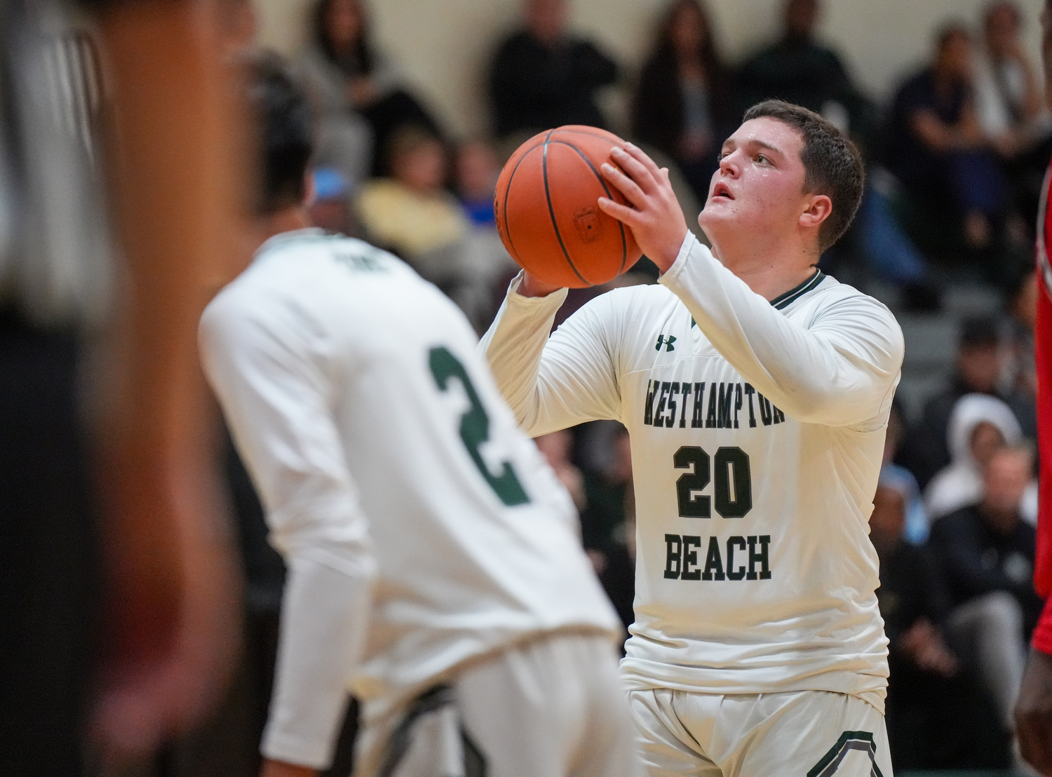 Senior power forward Andrew Mensch shoots from the free-throw line. RON ESPOSITO