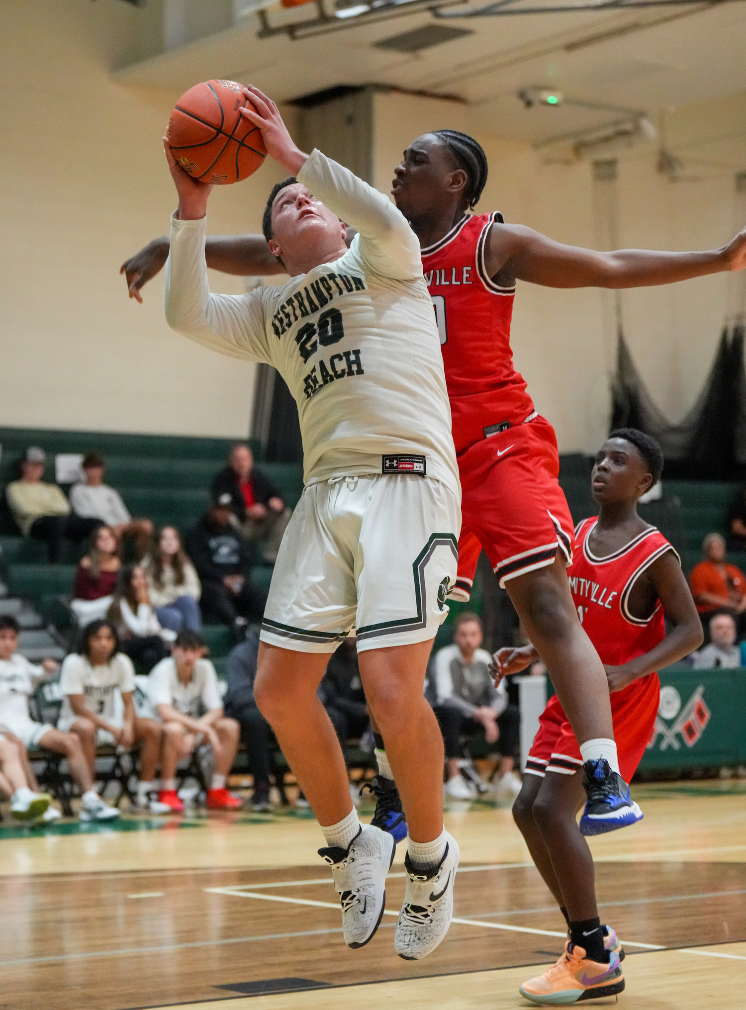 Senior power forward Andrew Mensch attacks the basket. RON ESPOSITO