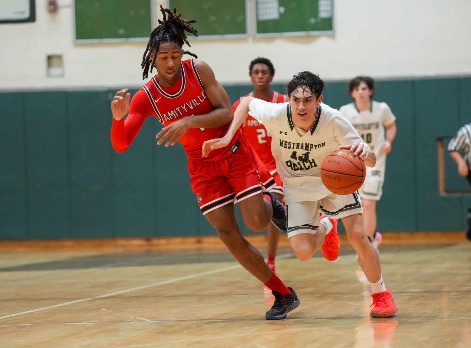 Junior guard Dante Quinones races downcourt. RON ESPOSITO