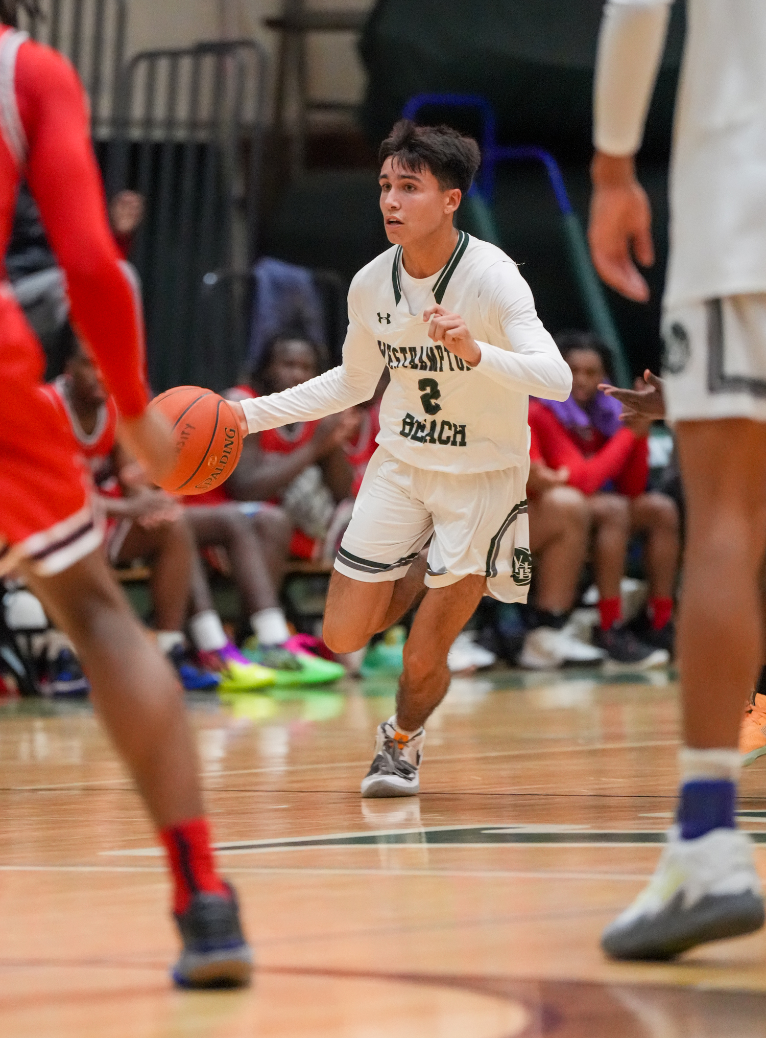 Senior guard Isaiah Ortiz looks for the play. RON ESPOSITO