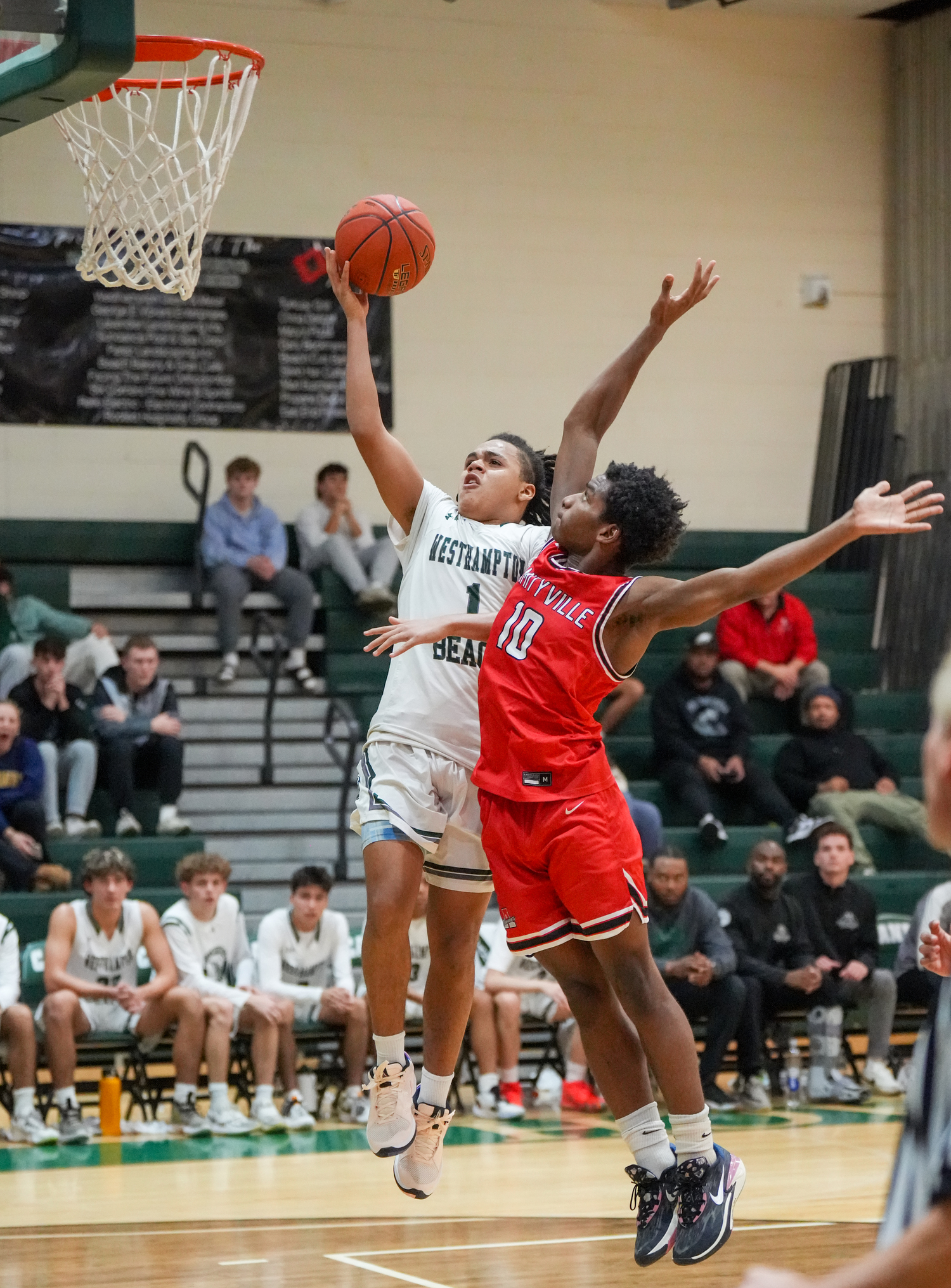 Sophomore point guard Malachi Bullock reaches for the rim. RON ESPOSITO