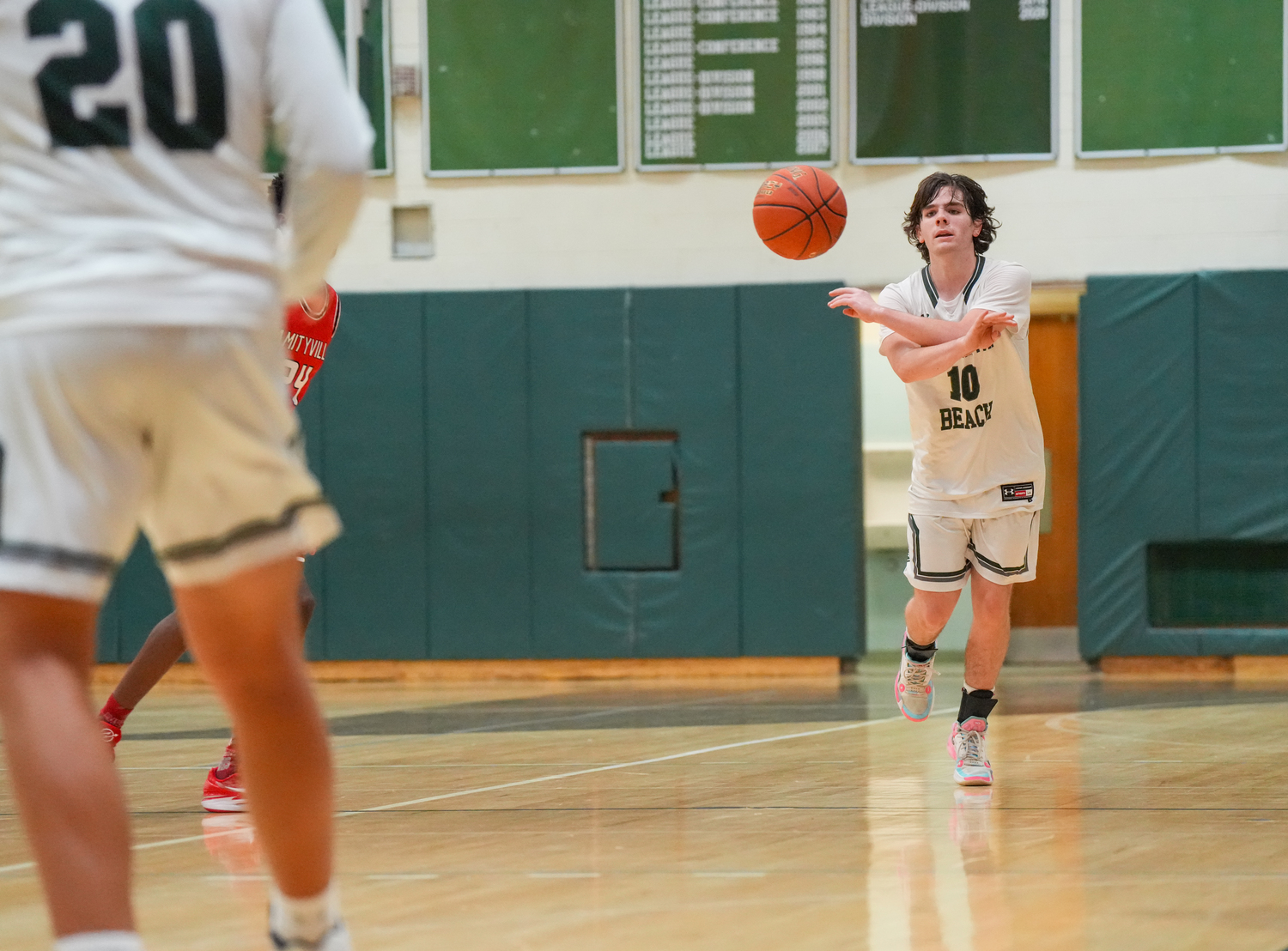 Sophomore shooting guard Truman Hahn sends the ball downcourt in transition. RON ESPOSITO