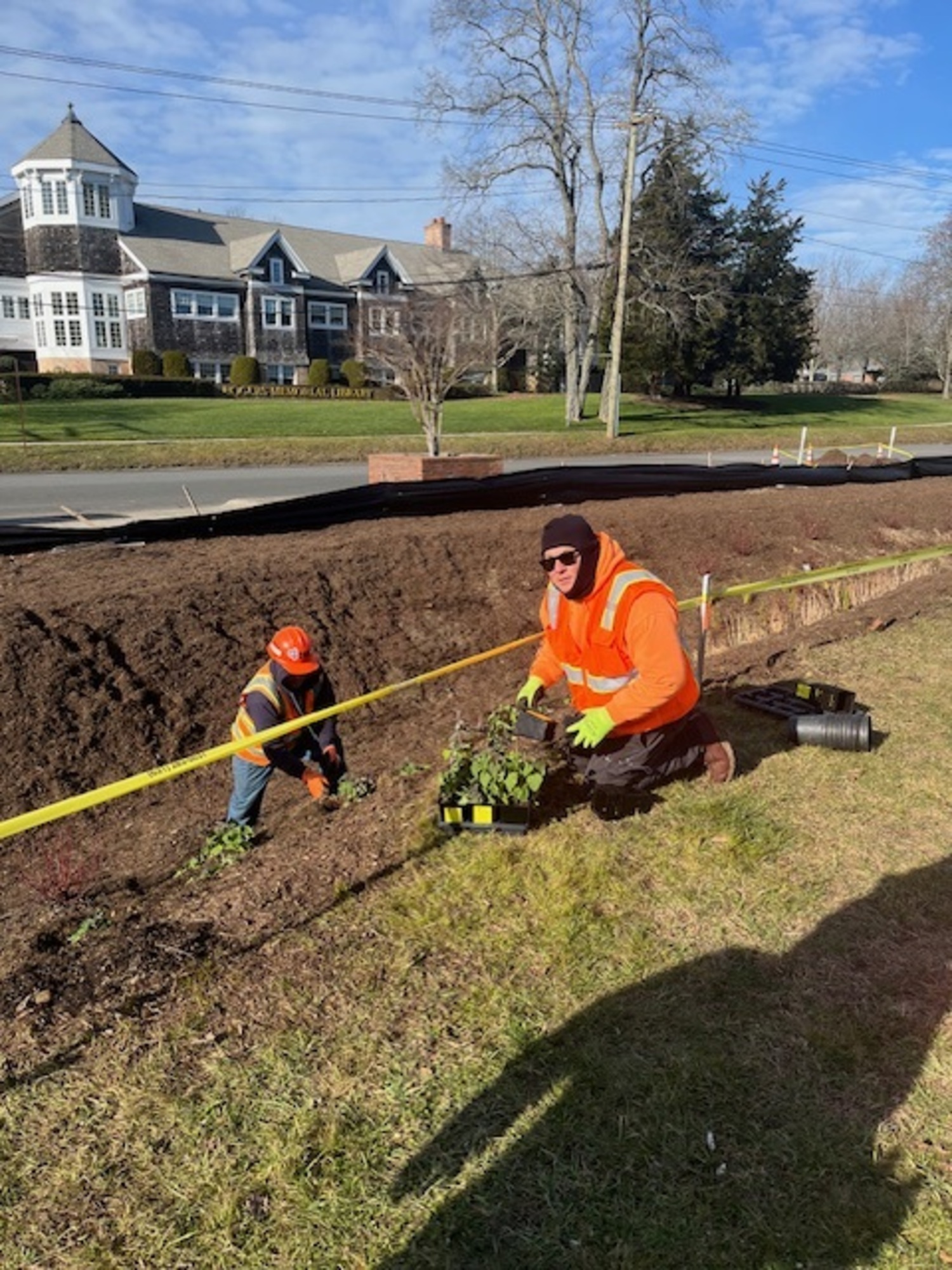 A newly installed bioswale at the corner of Windmill Lane and Nugent Street will help filter stormwater runoff and improve the health of Lake Agawam. It was installed on December 7, and paid for by more than $180,000 in grant funding from the town and county. KAREN BONTEMPO