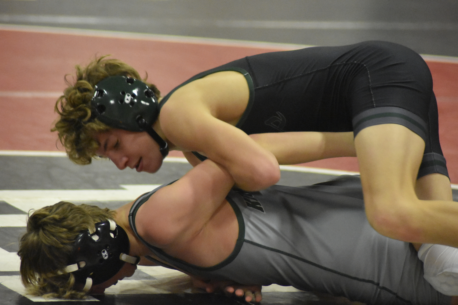 Westhampton Beach freshman Dylan Blenk works against his Kennedy opponent. DREW BUDD