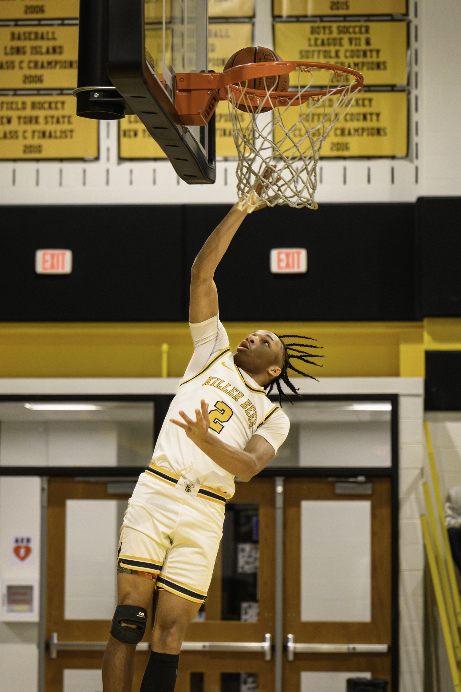 Jai Feaster scores the first basket of the night.   MARIANNE BARNETT