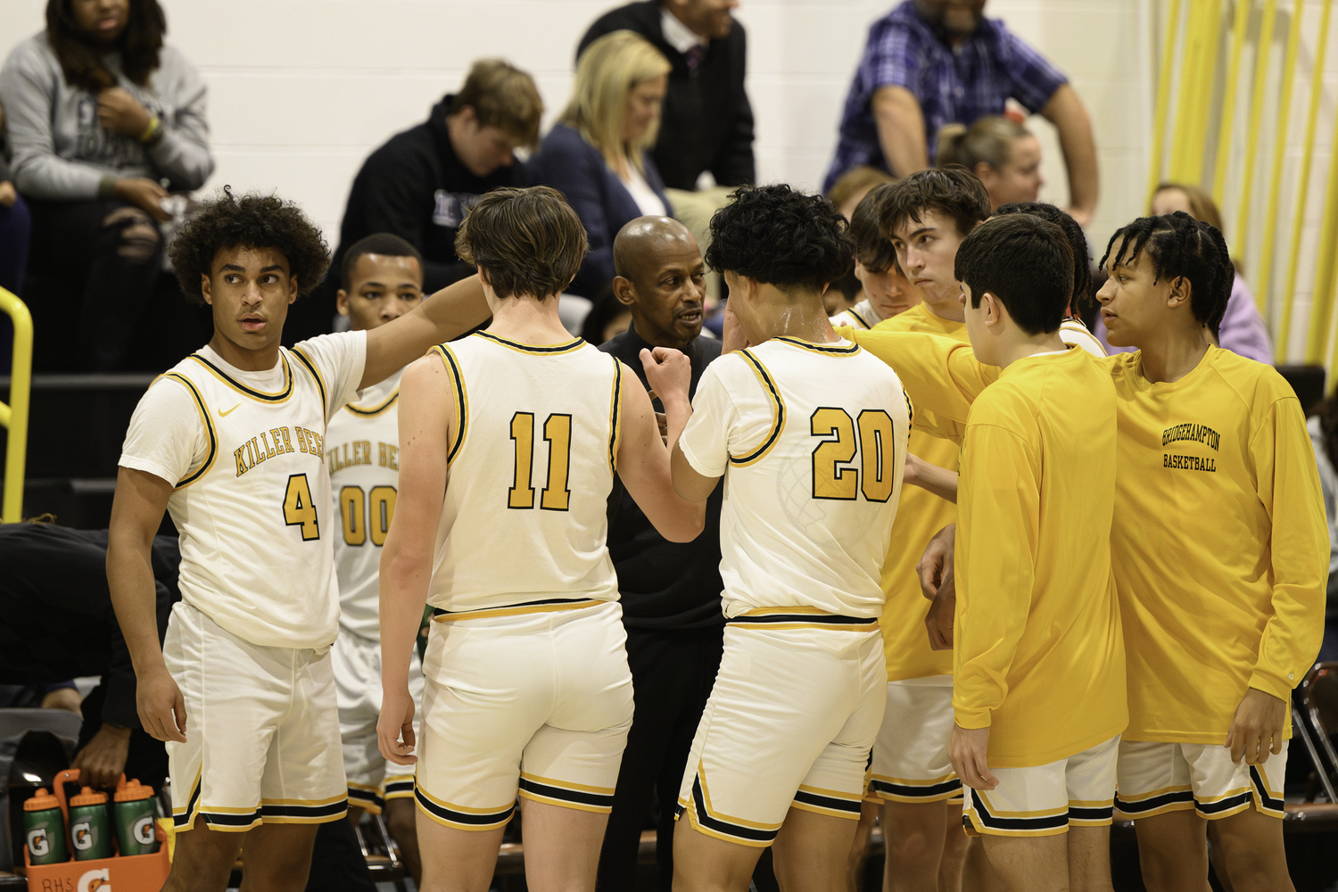 The Bees regroup during a timeout of their 64-52 loss to Ross on Thursday, January 18. They rebounded the very next day with a 68-42 victory over the Ravens.   MARIANNE BARNETT