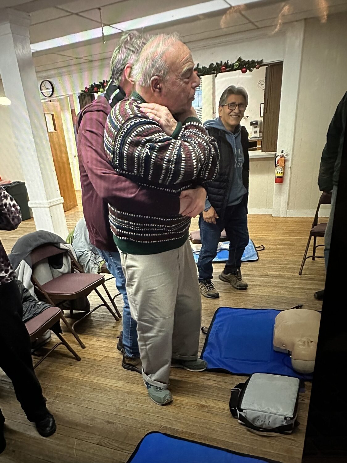 CPR instructor Susan Denis recently trained the  Sag Harbor Food Pantry volunteers, one group in January and another in November. Following food distribution, the volunteers, including one who is 90 years old, learned this life-saving skill. 
Denis was assisted by instructor Amanda Reifsteck. The participants in the January class were Bonnie Marty, Pat Matheson, Barbara McLean, Janet Grossman, Sharon McLean, Luis Urchima, Greg Churchill, Patrick Knowles, Robert Giordano, James Burns and Evie Ramunno. COURTESY SUSAN DENIS