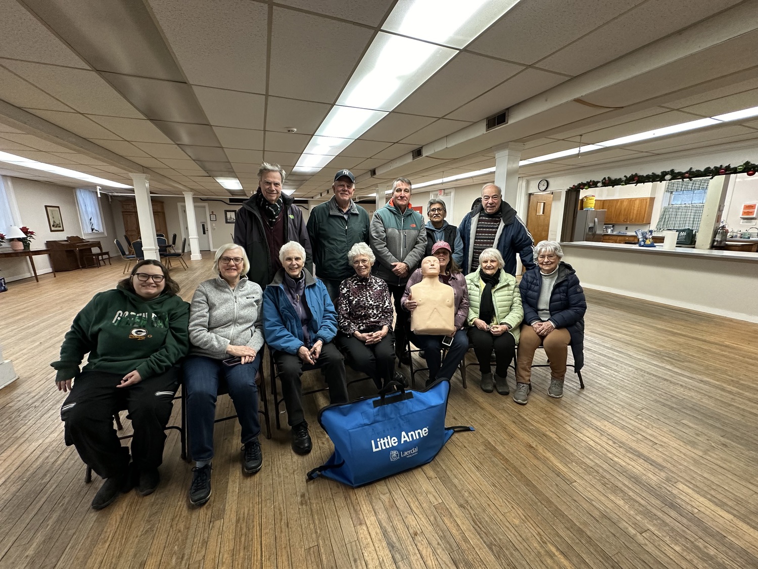 CPR instructor Susan Denis recently trained the  Sag Harbor Food Pantry volunteers, one group in January and another in November. Following food distribution, the volunteers, including one who is 90 years old, learned this life-saving skill. 
Denis was assisted by instructor Amanda Reifsteck. The participants in the January class were Bonnie Marty, Pat Matheson, Barbara McLean, Janet Grossman, Sharon McLean, Luis Urchima, Greg Churchill, Patrick Knowles, Robert Giordano, James Burns and Evie Ramunno. COURTESY SUSAN DENIS