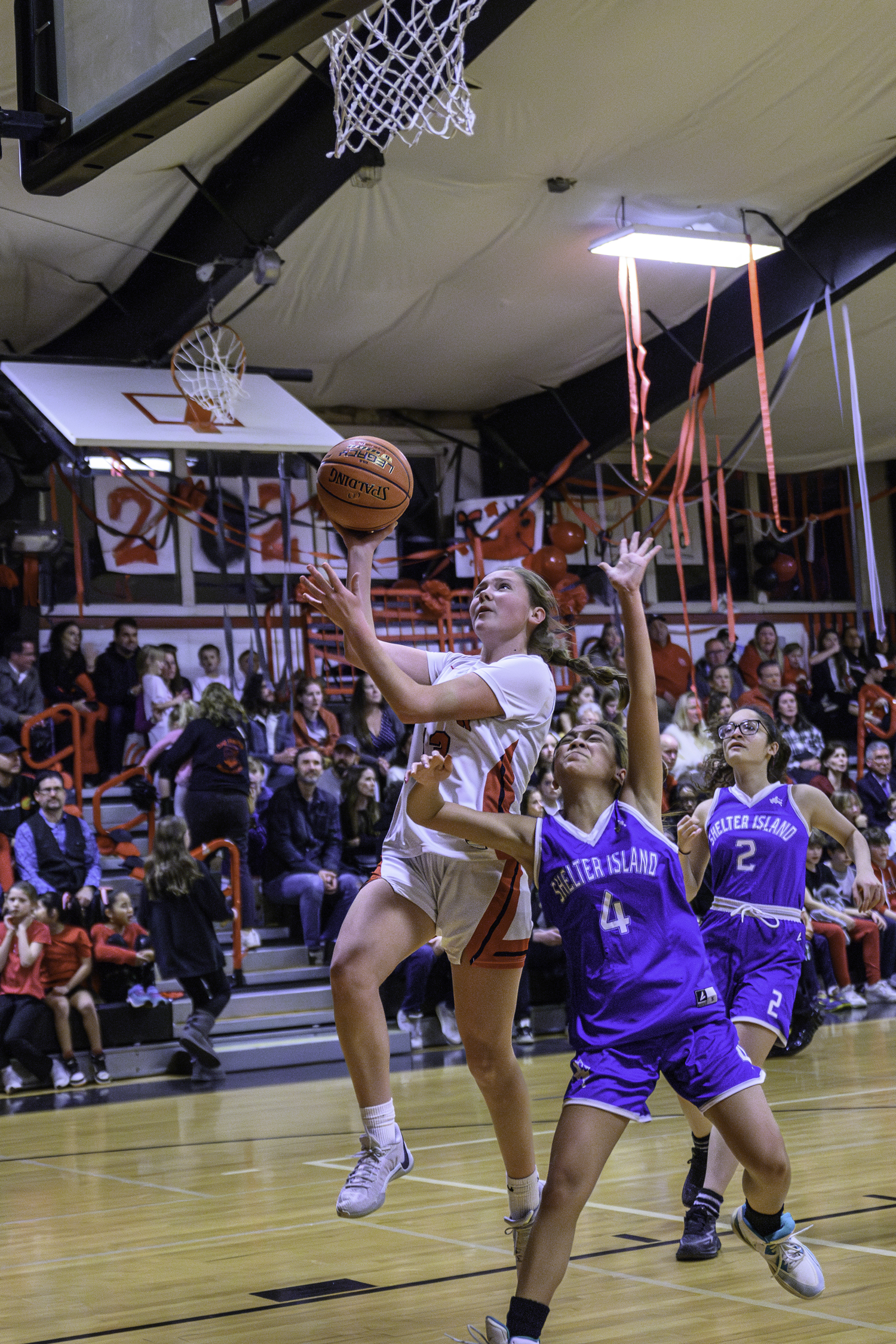 Pierson's Cali Wilson takes on some contact as she goes up for two points.   MARIANNE BARNETT