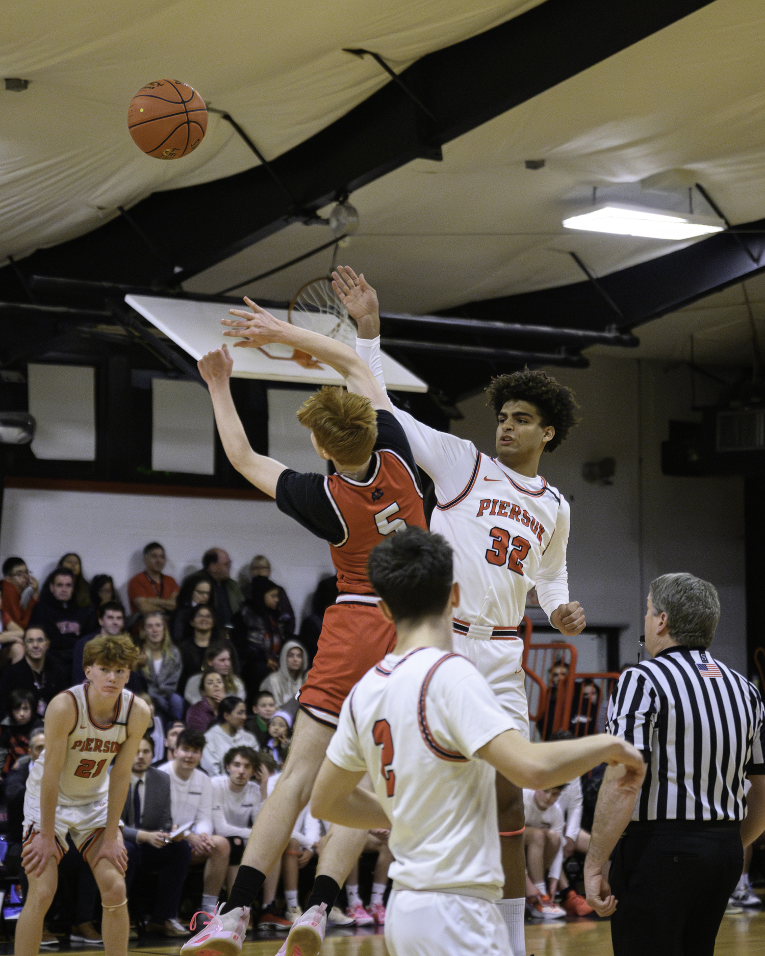 Senior Charlie McLean wins the tip-off for the Whalers.   MARIANNE BARNETT