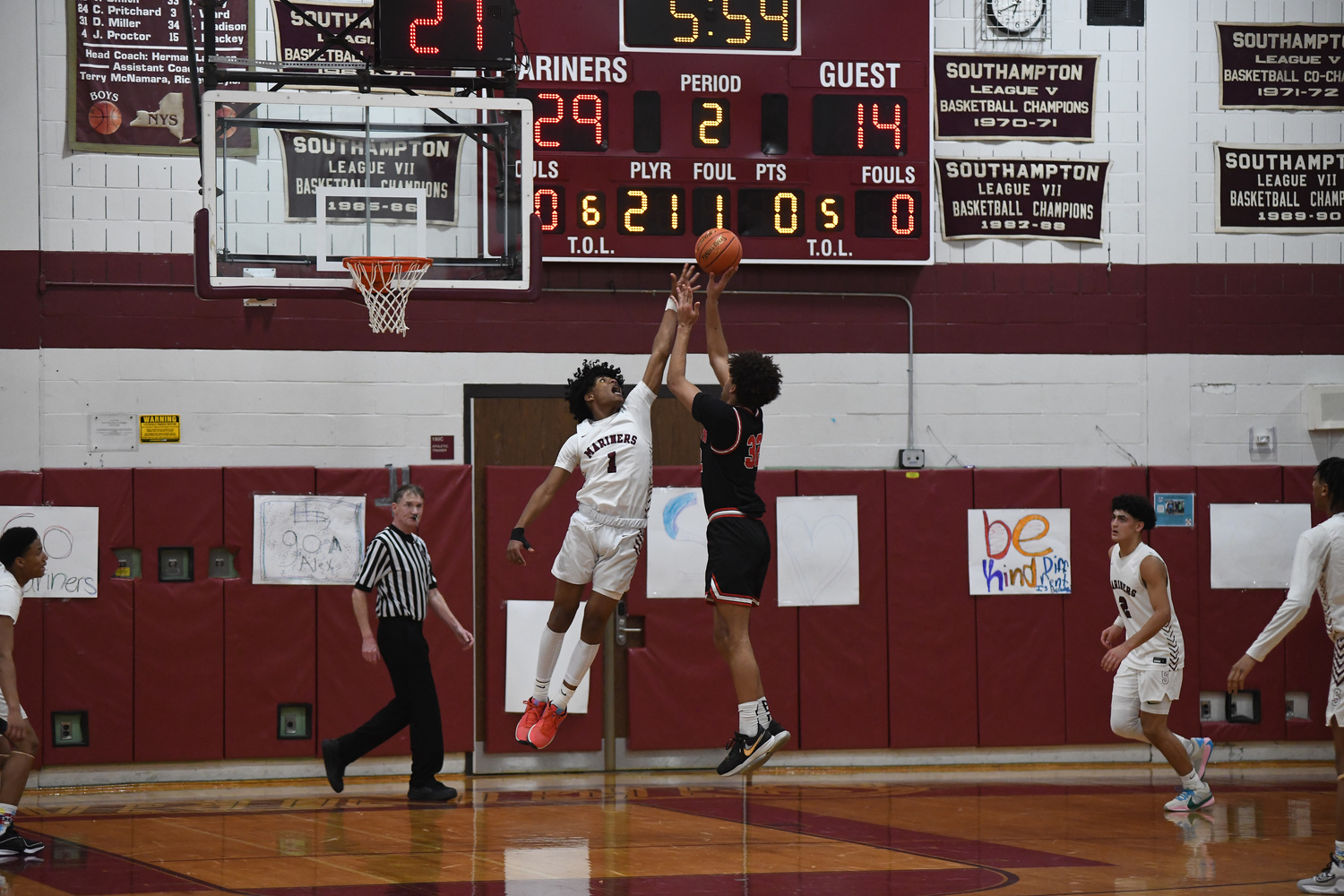 Pierson senior Charlie McLean shoots over Southampton senior Dominick White.    DOUG KUNTZ