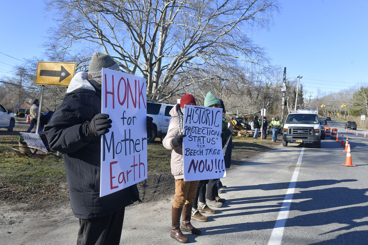 Members of the Shinnecock Nation and the general public gathered at the large, old beech tree at the corner of East Gate Road and Hill Street on Monday in attempts to preserve it from harm.  DANA SHAW