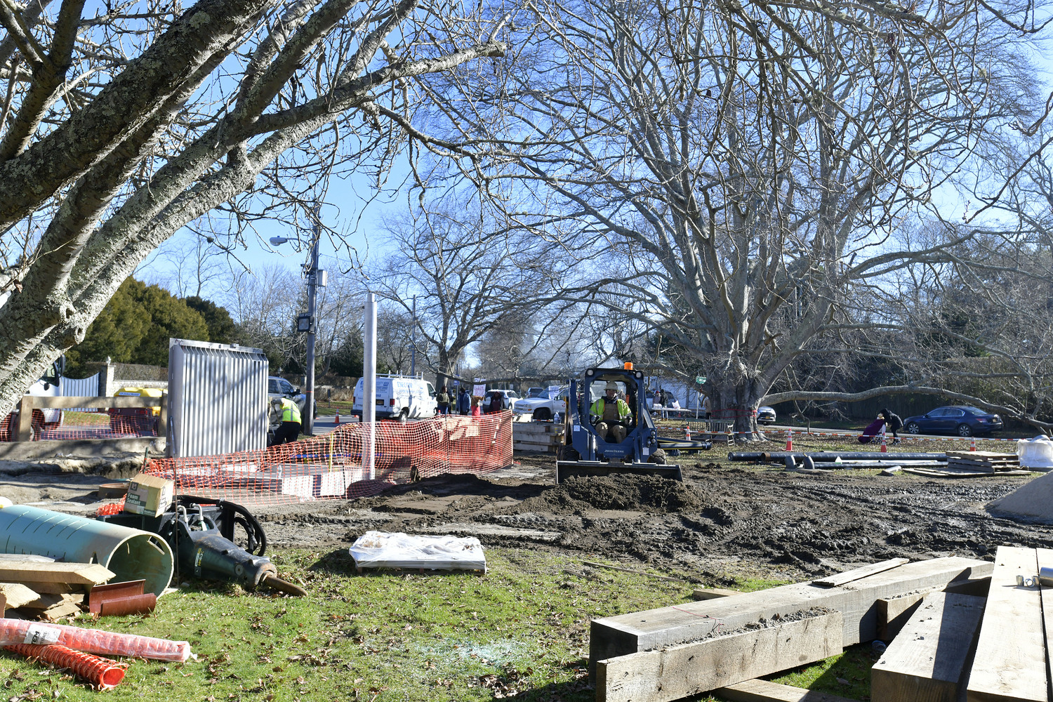 Members of the Shinnecock Nation and the general public gathered at the large, old beech tree at the corner of East Gate Road and Hill Street on Monday in attempts to preserve it from harm.  DANA SHAW