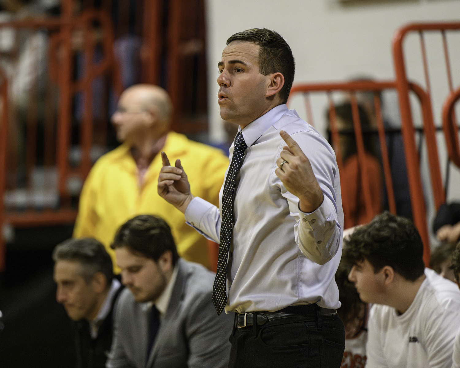 Pierson head coach Dan White communicates with his team on Friday night.   MARIANNE BARNETT