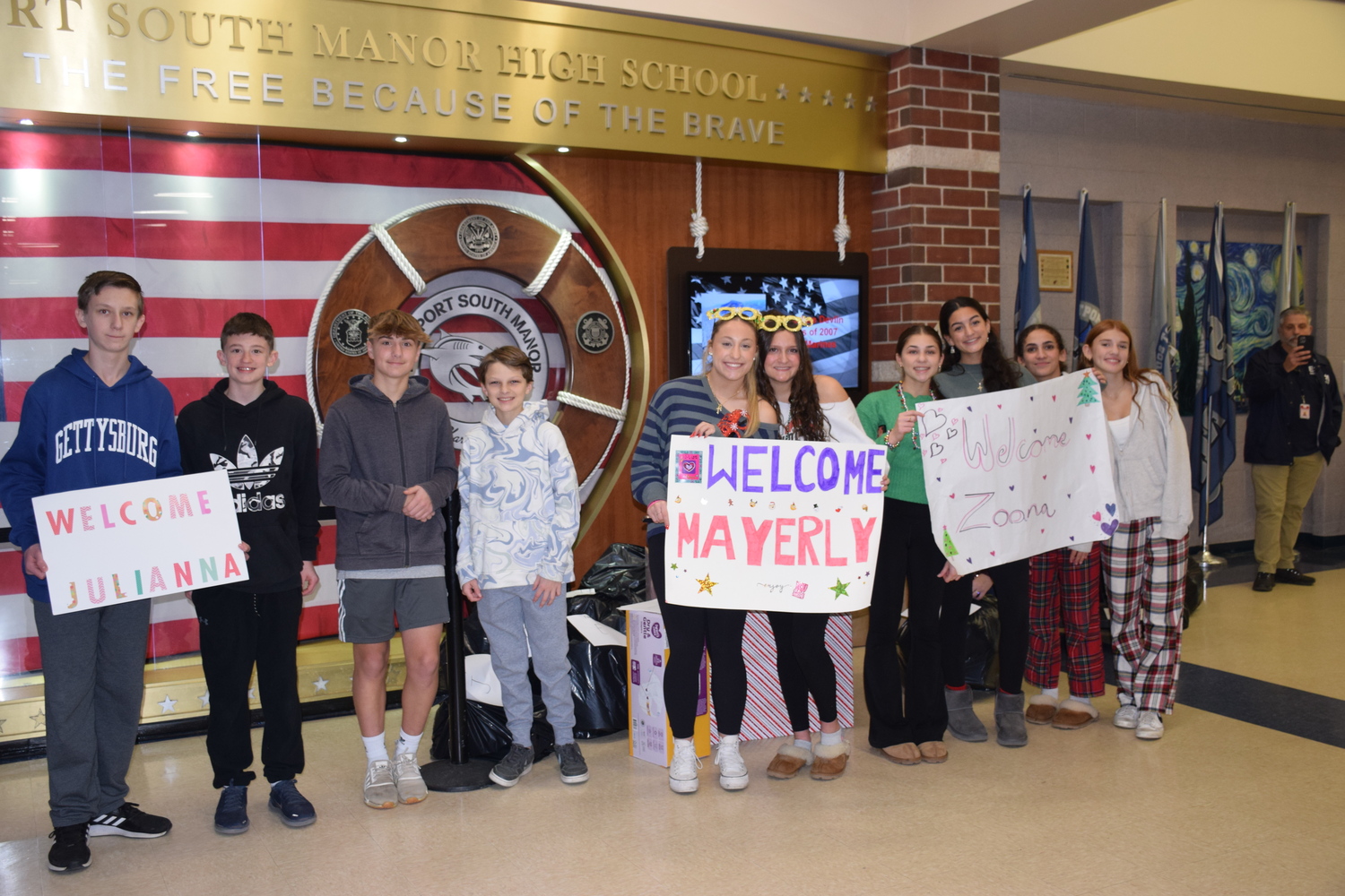 Members of the Eastport-South Manor Jr.-Sr. High School National Junior Honor Society welcomed students from PS82Q, known as The Hammond School, for a day of festivities and a chance to meet in person on Dec. 20. The Eastport-South Manor students have been pen pals to the New York City students since the start of the school year. COURTESY EASTPORT-SOUTH MANOR SCHOOL DISTRICT