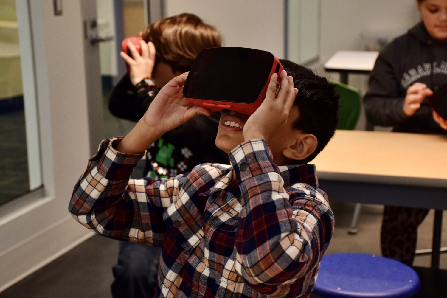 Fifth grade students at Eastport Elementary School took an expedition to Aztec and Mayan civilizations during a virtual reality field trip with Eastern Suffolk BOCES educational technology coach Jenna Reda. Using the Google Expedition App and virtual reality headsets, the students were able to apply their knowledge of these civilizations by viewing scenes and descriptions of historical cities such as Tulum, Palenque, and Cichenitza. COURTESY EASTPORT-SOUTH MANOR SCHOOL DISTRICT