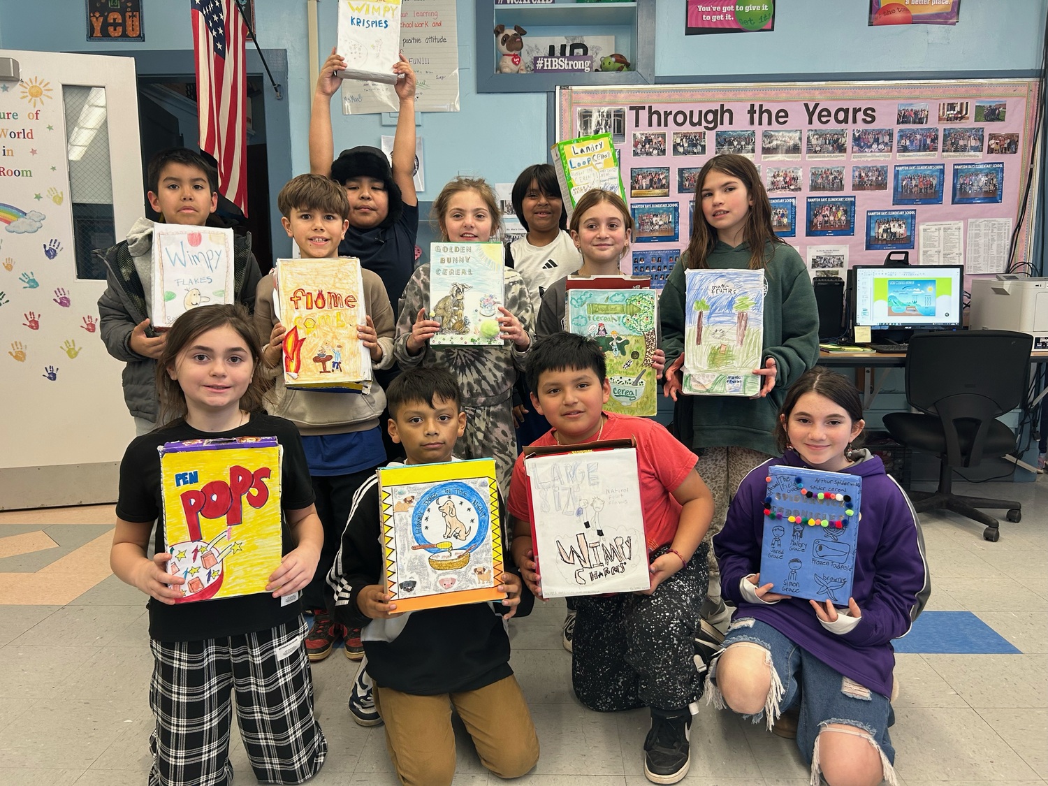 Hampton Bays Elementary School fourth grade students recently created cereal box book reports as part of their fiction reading series. Each student came up with a unique name for their cereal based on the book they read, and all students presented their reports to the class. COURTESY HAMPTON BAYS SCHOOL DISTRICT