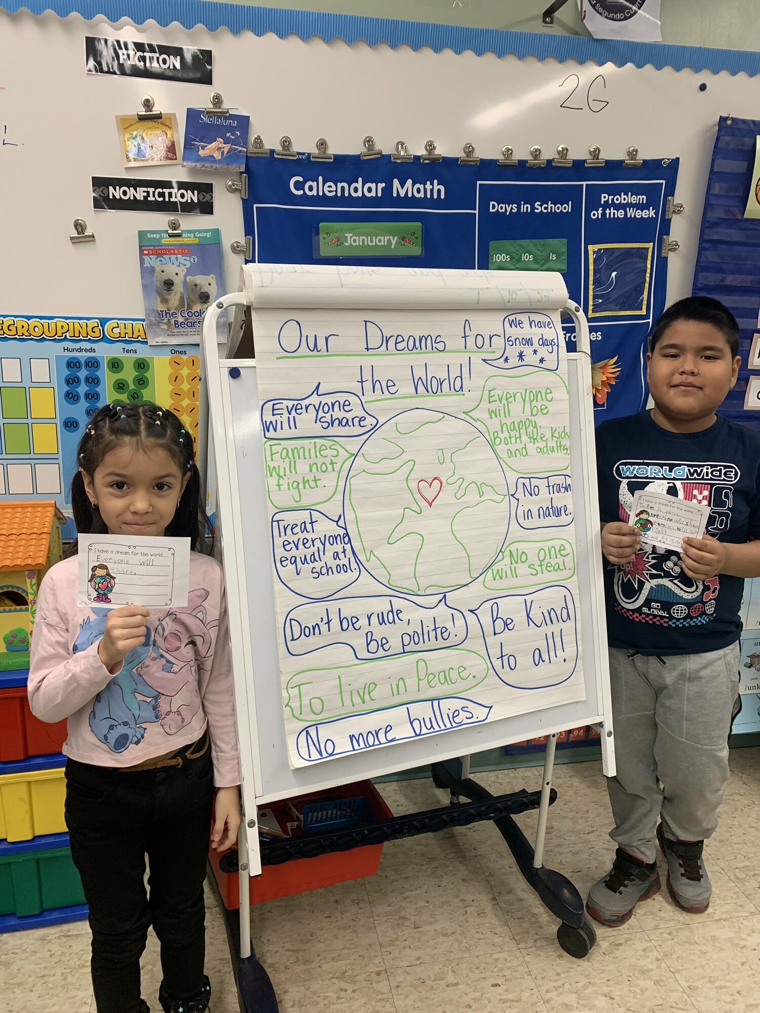 To celebrate Martin Luther King Jr. Day, Hampton Bays Elementary School
students in Krista Savino's and Elizabeth Scott's class, including Nikol Arcila, left, and Axel Coria Ayal, learned about the life and message of
Dr. King and then wrote their own dreams for the world. The students were eager to share their ideas about how they want to make the world a better place. COURTESY HAMPTON BAYS SCHOOL DISTRICT