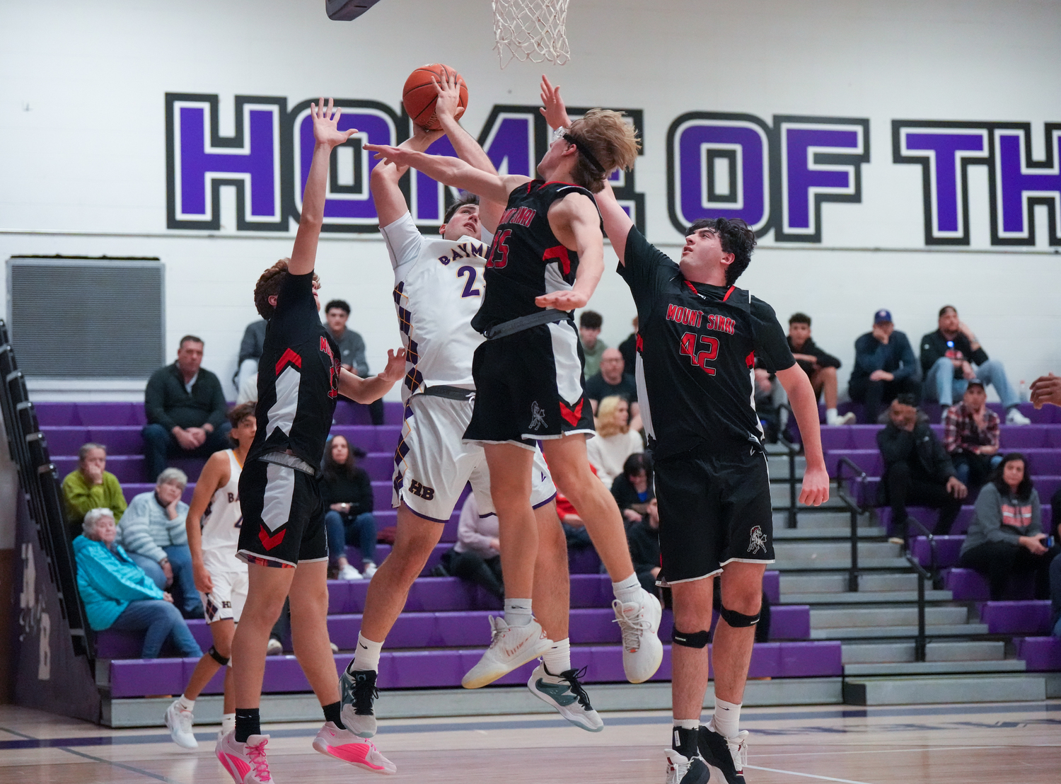 Hampton Bays senior Isaiah Lattanzio is fouled and goes to the free throw line.   RON ESPOSITO