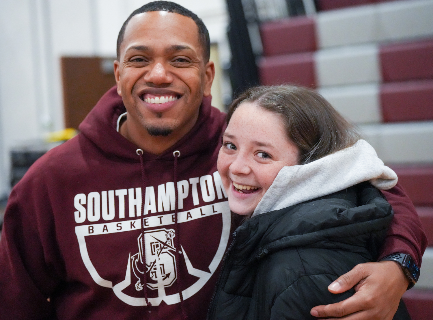 Southampton girls JV basketball coach Jalai Duroseau with graduate Paige Garvin at Friday night's game.  RON ESPOSITO/SOUTHAMPTON SCHOOL DSITRICT