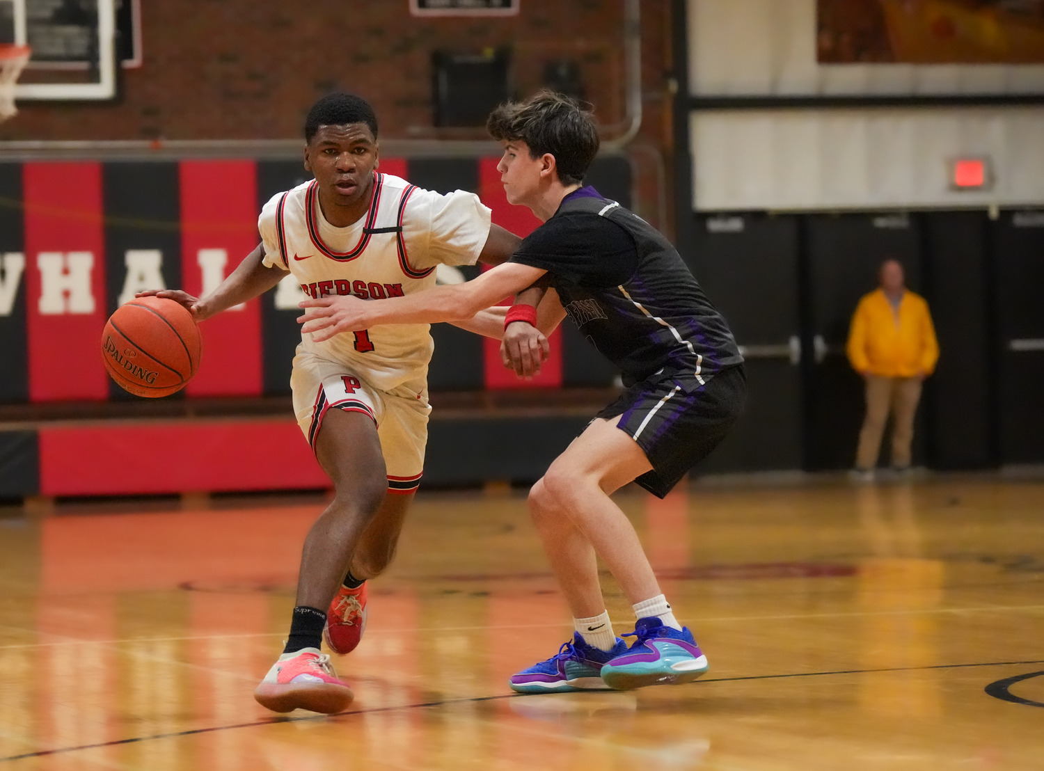 Pierson senior Keanu King fends off a Port Jefferson player.   RON ESPOSITO