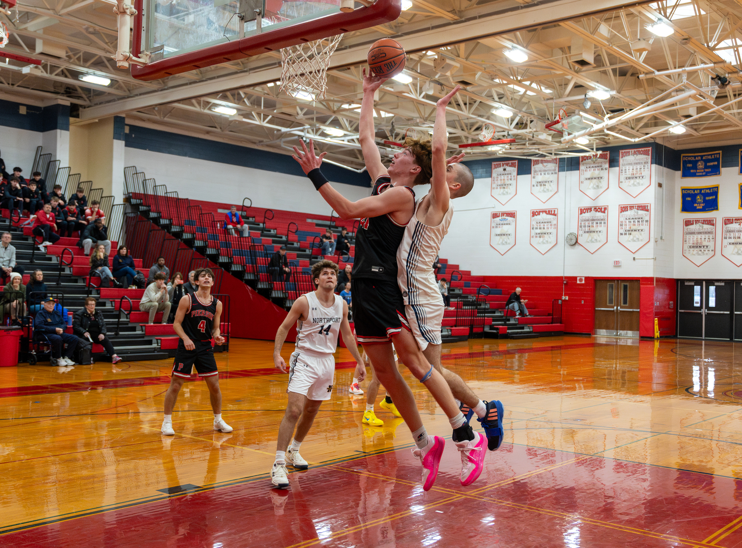 Pierson's Luke Seltzer is about to be fouled as he goes up for two points.   RON ESPOSITO