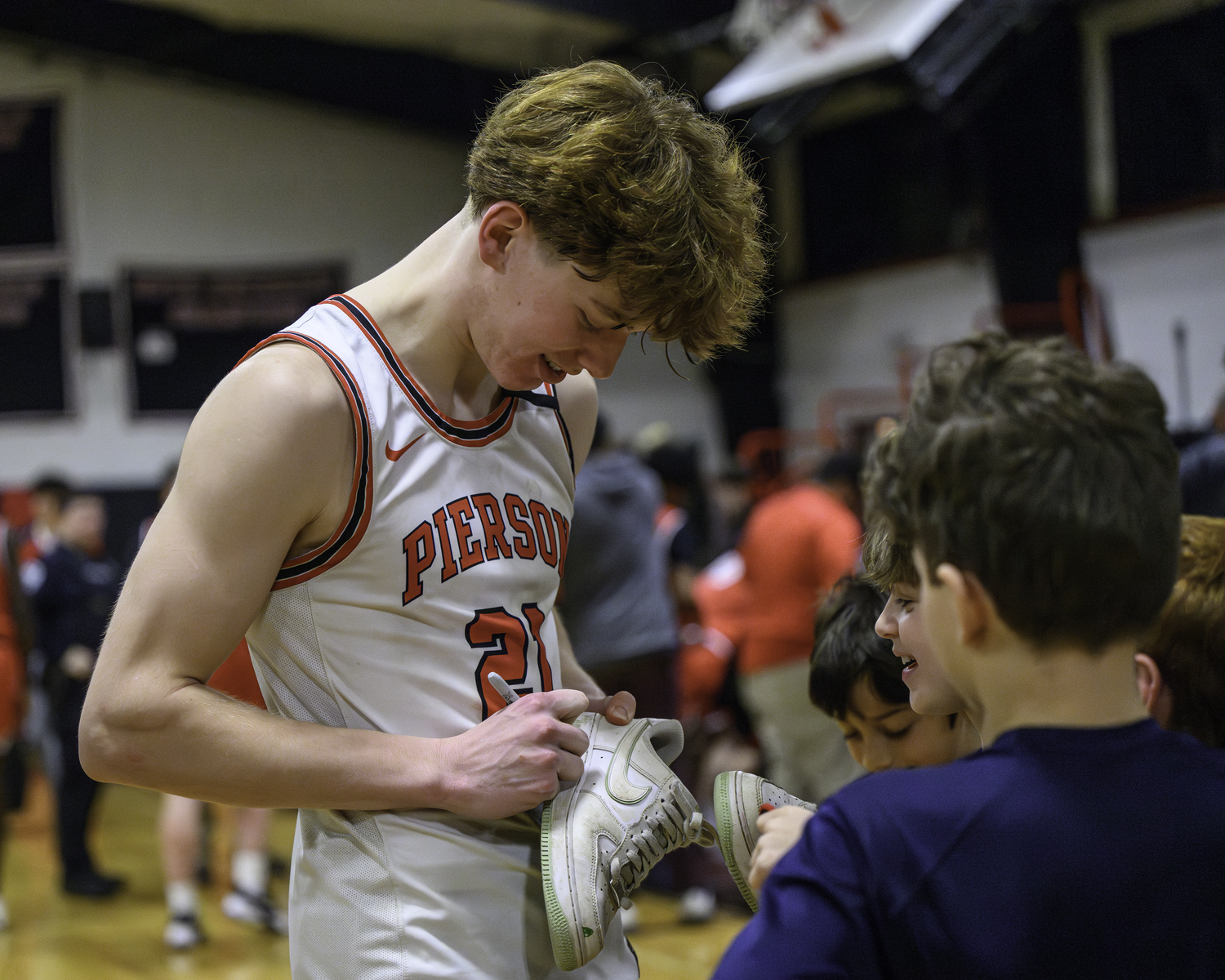 Pierson senior Luke Seltzer was the star on Friday night after landing a big alley-oop in the victory over Center Moriches. After the game, Seltzer was signing shoes for future varsity players.   MARIANNE BARNETT