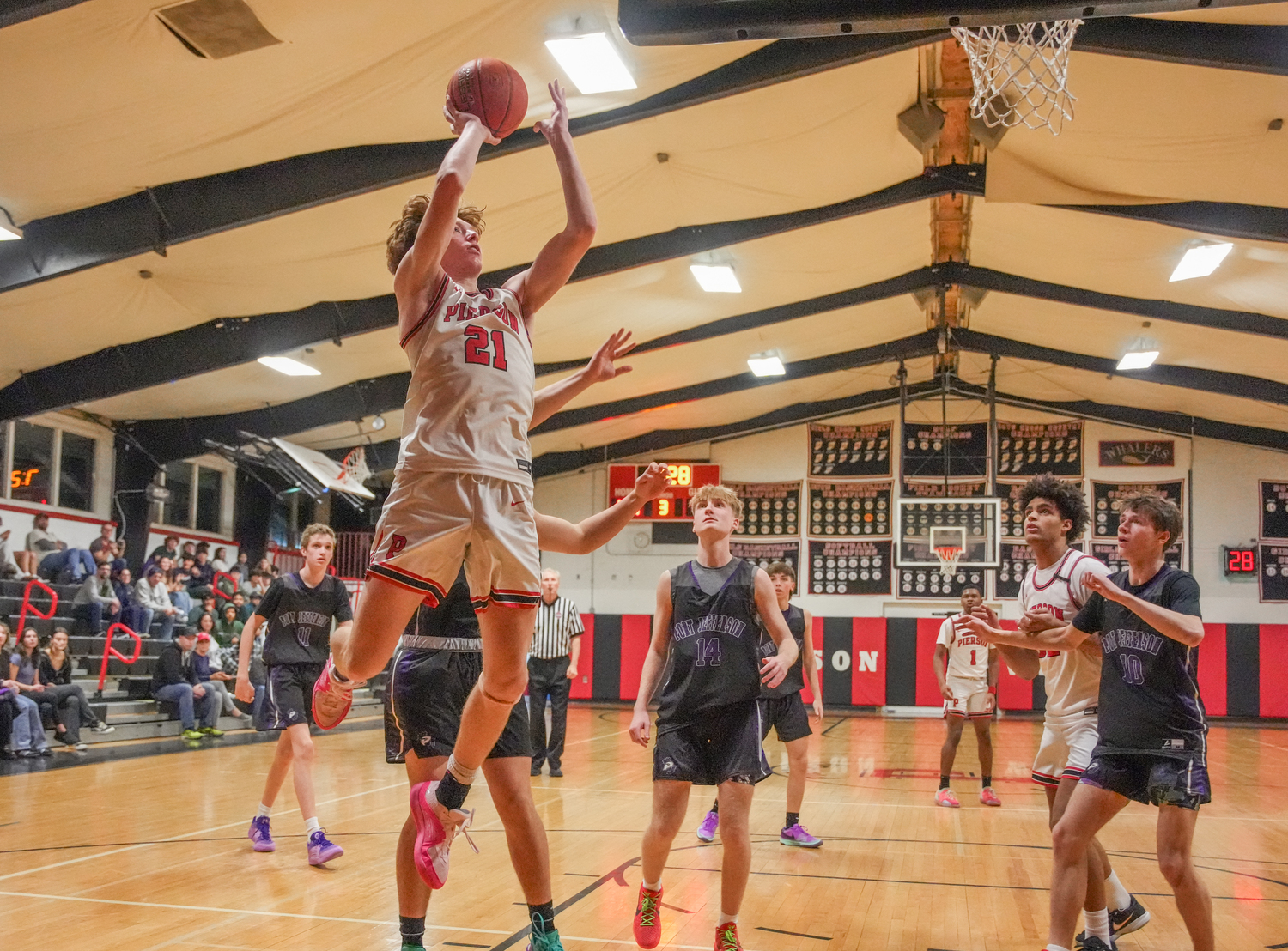 Pierson senior Luke Seltzer goes up for two of 15 points.   RON ESPOSITO