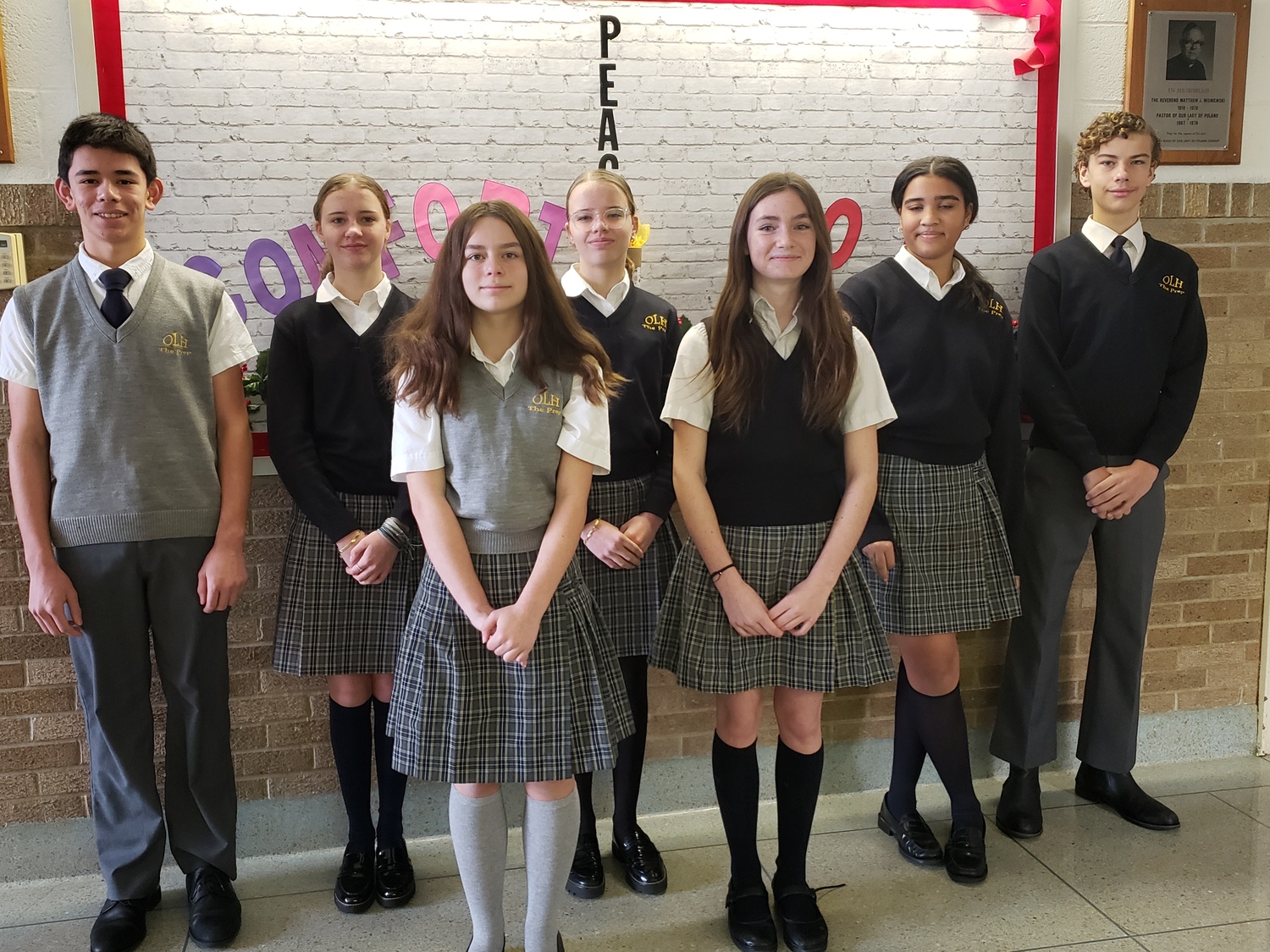 Among the 10 Our Lady of the Hamptons School students who have been awarded scholarships to Catholic high schools are, from left, Kai Gomolka, Eva Vijfinkel, Autumn Malave, Mia Vijfvinkel, Quinn Cameron, Aliah Donohoe, and Lucas Carballal. COURTESY OUR LADY OF THE HAMPTONS SCHOOL