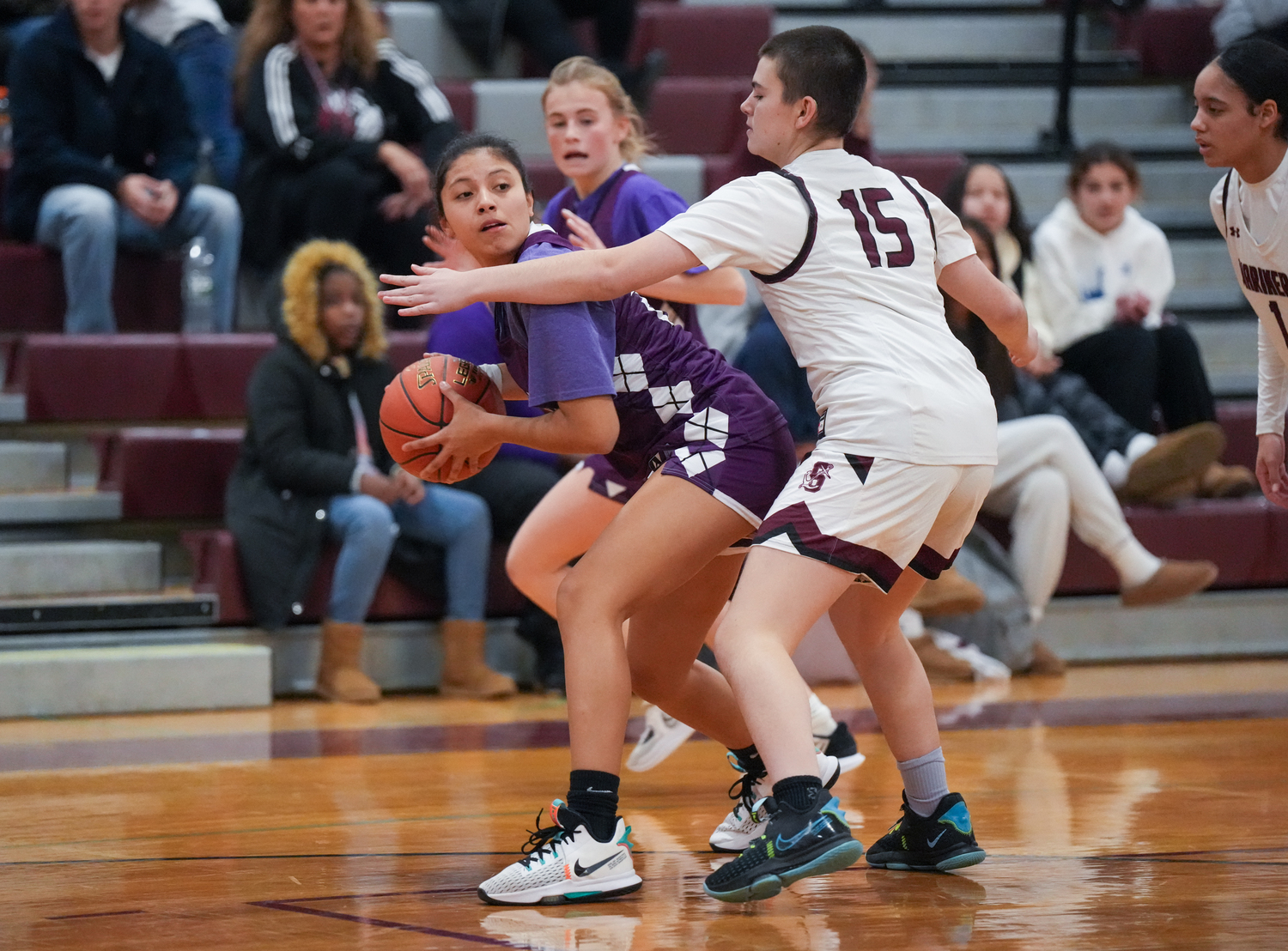 Kimmy Cisneros of Hampton Bays looks to pass out of pressure by Southampton's Riley Moredock.  RON ESPOSITO/SOUTHAMPTON SCHOOL DSITRICT