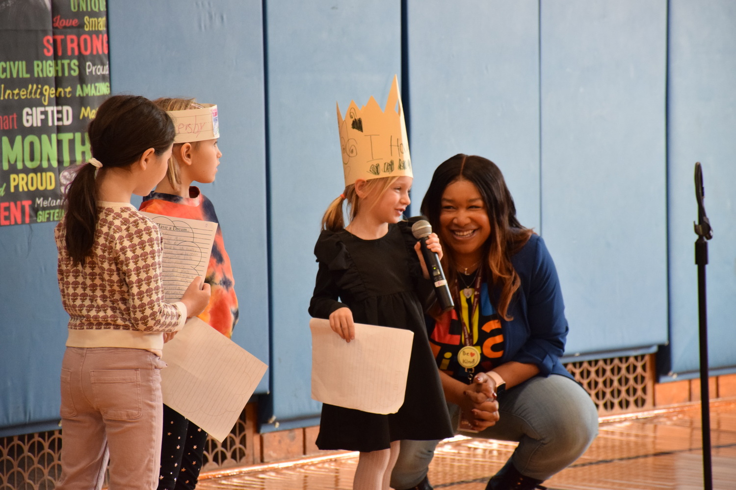 Southampton Elementary School celebrated Dr. Martin Luther King Jr.’s birthday with an assembly that featured “I Have a Dream” speeches by six students who won a January challenge to write about their own dreams. The students — Blake Epley, Jia Hartline, Luna Lysogorski, Kaya Marvel, Amelie Nartey and Aria Russel — spoke about their dreams to spread kindness, improve the environment and add more color to the world through art. The assembly also featured trivia associated with MLK’s life. Assistant Principal Danielle McCoy listened to kindergartner Luna Lysogorski. COURTESY SOUTHAMPTON SCHOOL DISTRICT