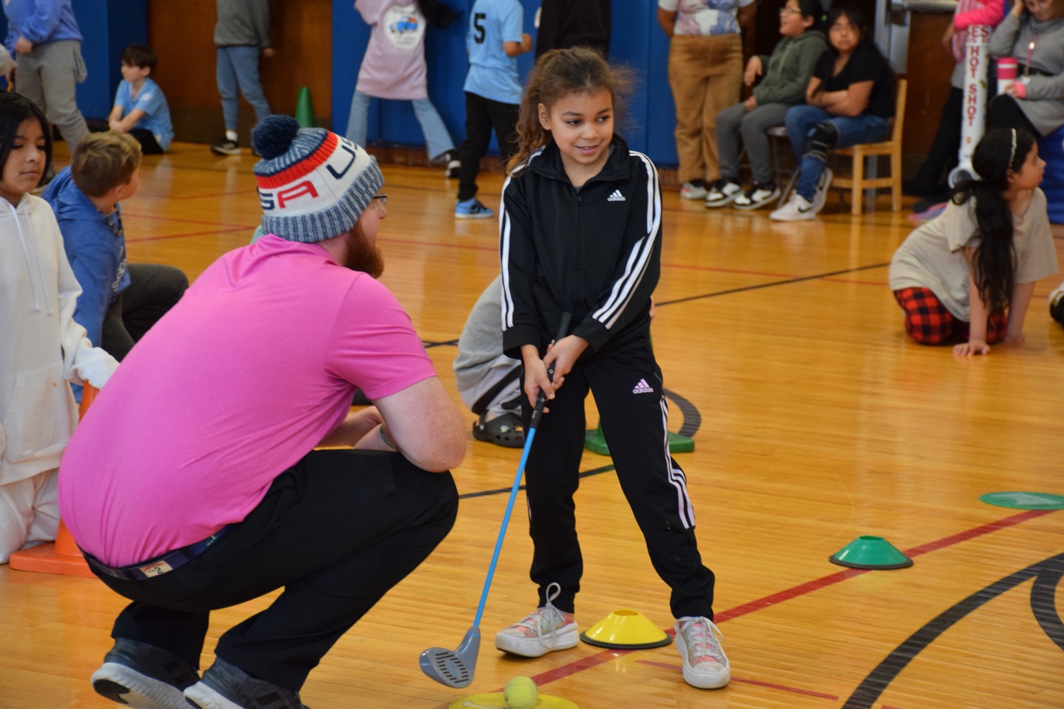 Southampton Elementary School students, including Anabella Smith are learning to drive and putt as part of a two-week golf program at their school. Through the program, Montauk Downs Golf Course and the Golf Channel Academy with Kelley Brooke are providing golf skill training to the students through fun, and engaging activities. The students learned the basics of the sport during their gym periods. COURTESY SOUTHAMTPON SCHOOL DISTRICT