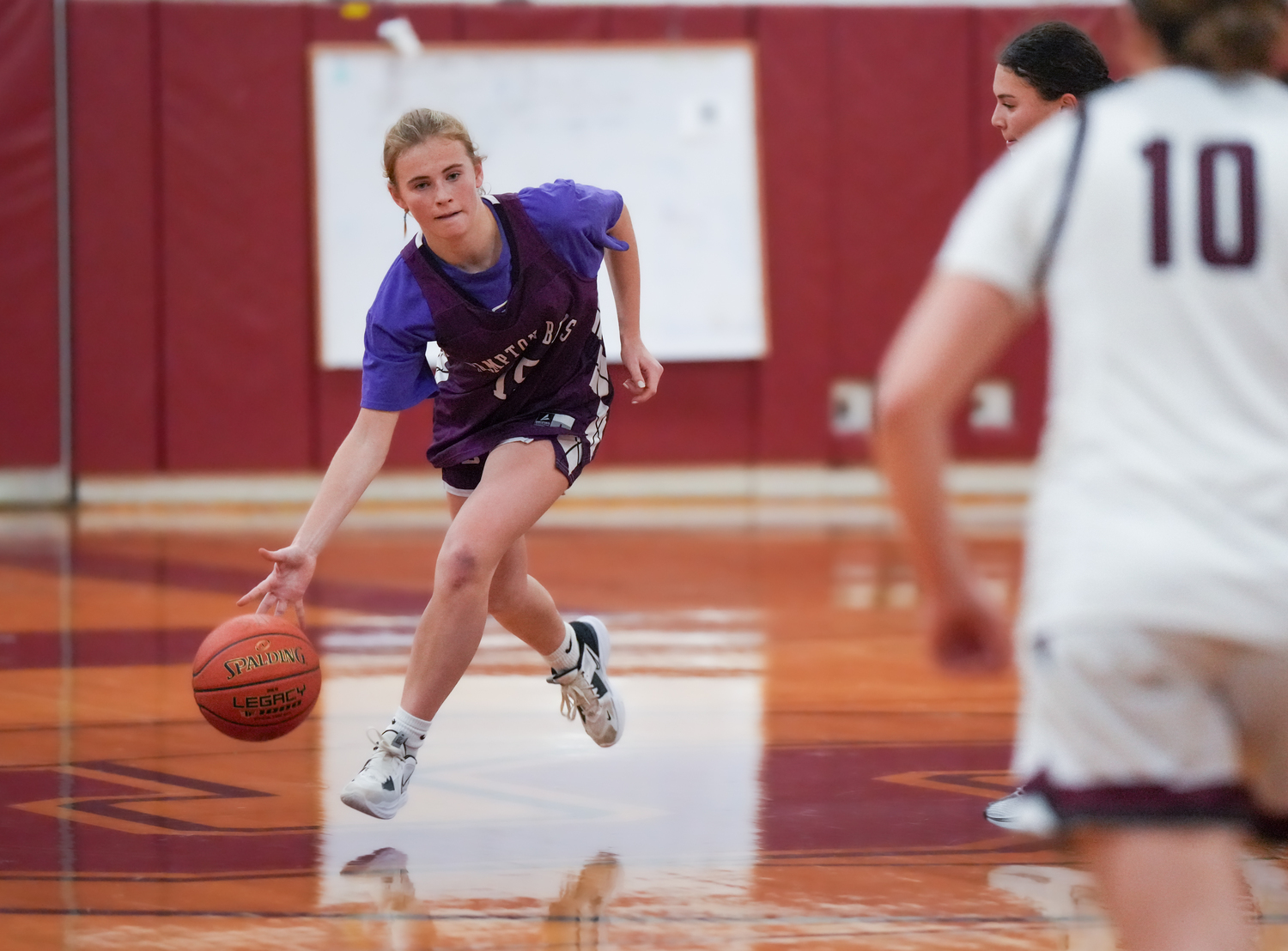 Hampton Bays sophomore Taylor Meyers dribbles the ball at halfcourt. RON ESPOSITO/SOUTHAMPTON SCHOOL DSITRICT