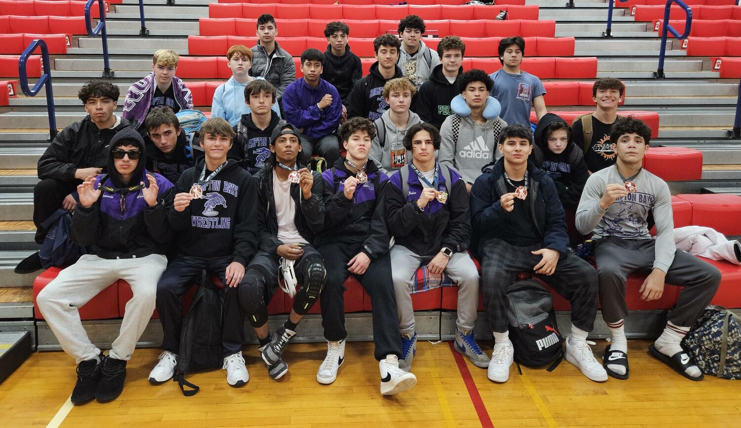 The Hampton Bays wrestling team placed third at the St. John the Baptist Cougar Pride Invitational on Saturday finishing with eight placewinners led by Kevin Saa Pachecho who won the 124-pound weight class.