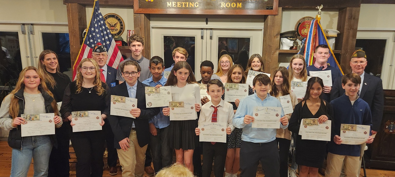 Veterans of Foreign Wars Post 5350 held its Voice of Democracy and Patriots Pen awards ceremony on January 25. Along with honoring its Hampton Bays High School Teacher of the Year, Rachel Kelsh, students from Westhampton Beach, Hampton Bays, Quogue, East Quogue, Raynor Country Day School and Remsenburg-Speonk School all received awards for their outstanding oratorical and essay submissions.  COURTESY VFW POST 5350