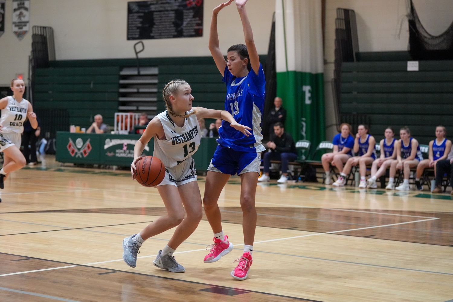 Freshman guard Kate Sweet looks to make a play around a defender. RON ESPOSITO