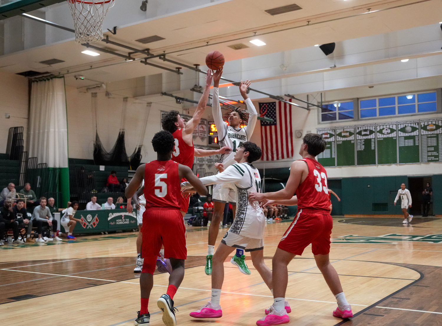 Junior center Jorden Bennett with a jump shot in a game against Half Hollow Hills West January 11. RON ESPOSITO