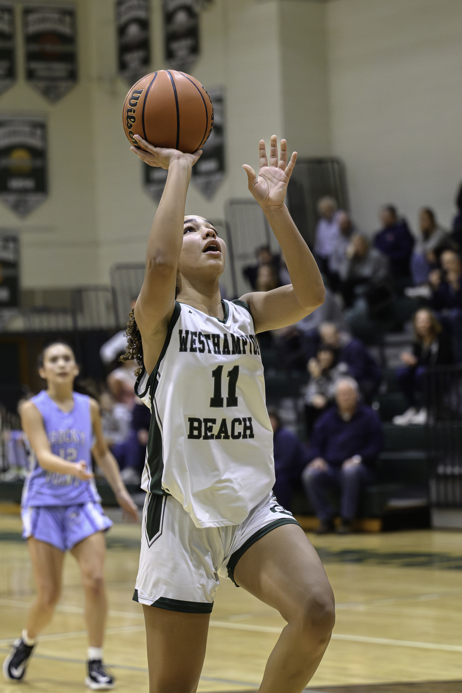 Sophomore center Jasmine Taylor shoots from under the basket. MARIANNE BARNETT