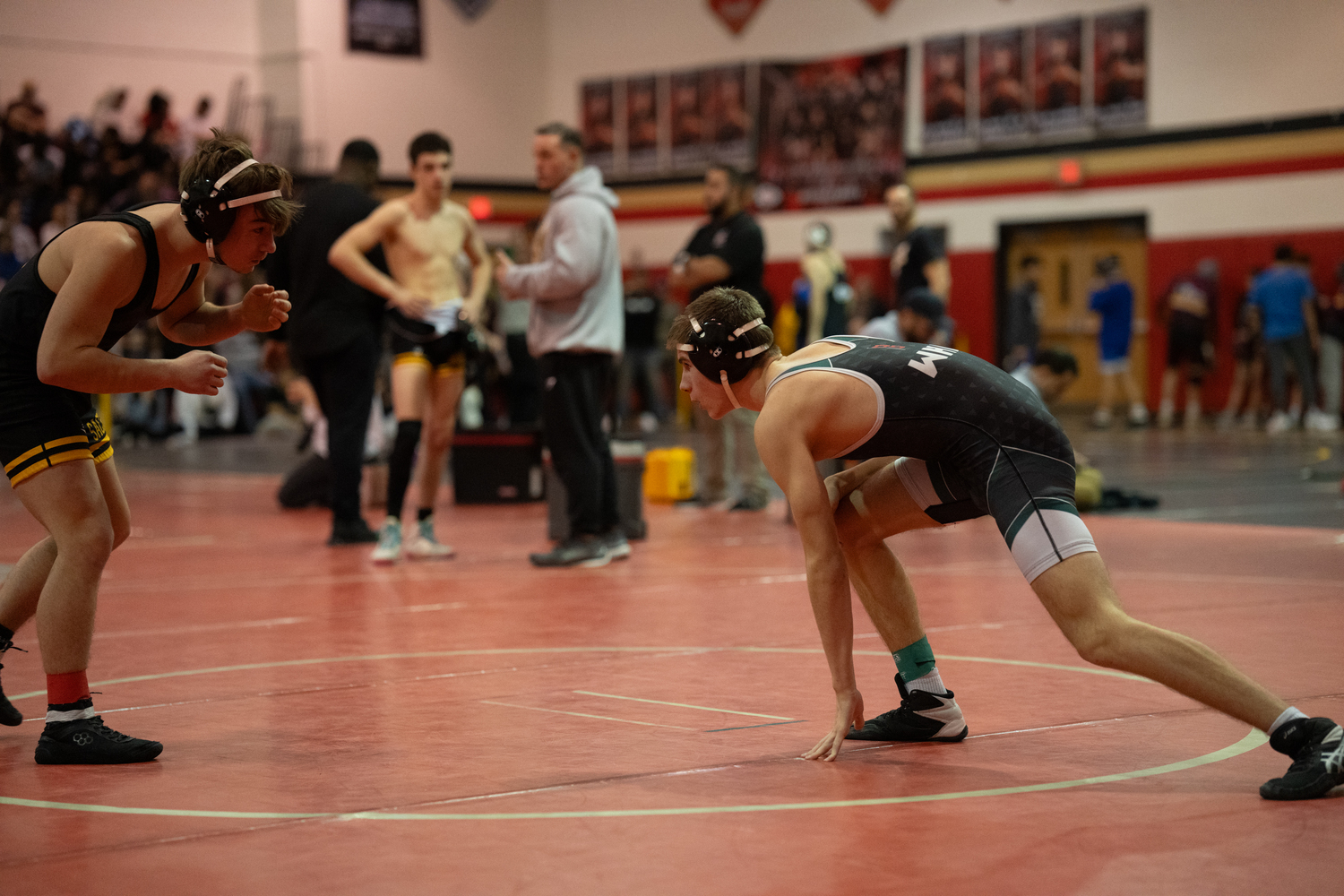 Tadhg Green looks for an opening on a Sachem North wrestler.  RON ESPOSITO