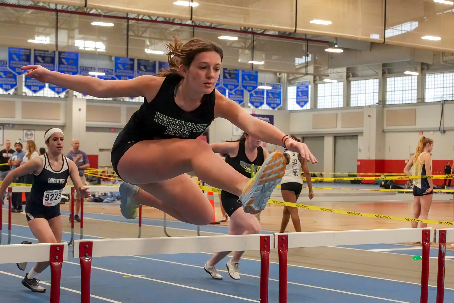 Westhampton Beach freshman Olivia Beardslee in the 55-meter hurdles at the Zeitler Relays on Saturday.    RON ESPOSITO